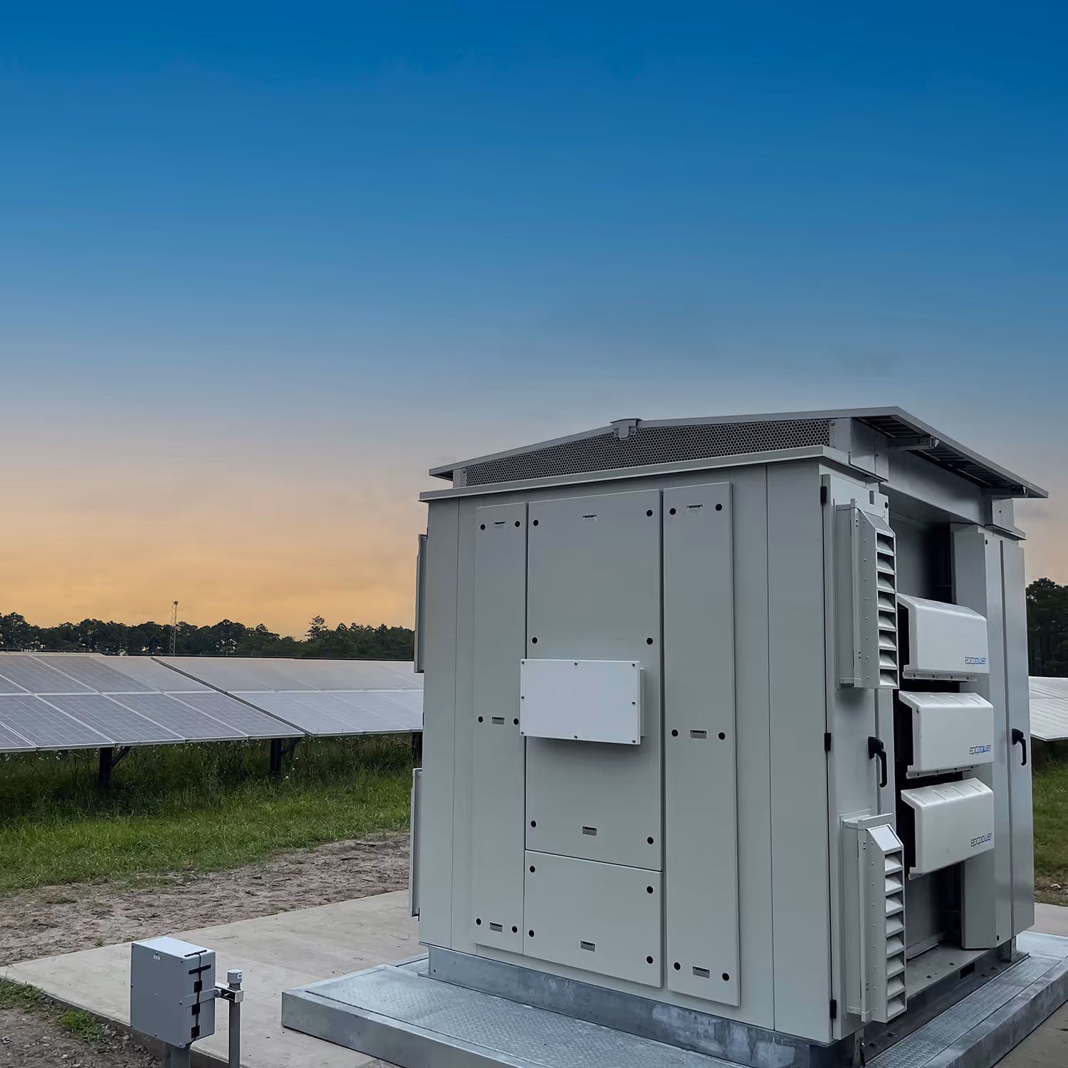 EPC Power M-System unit beside a solar array.