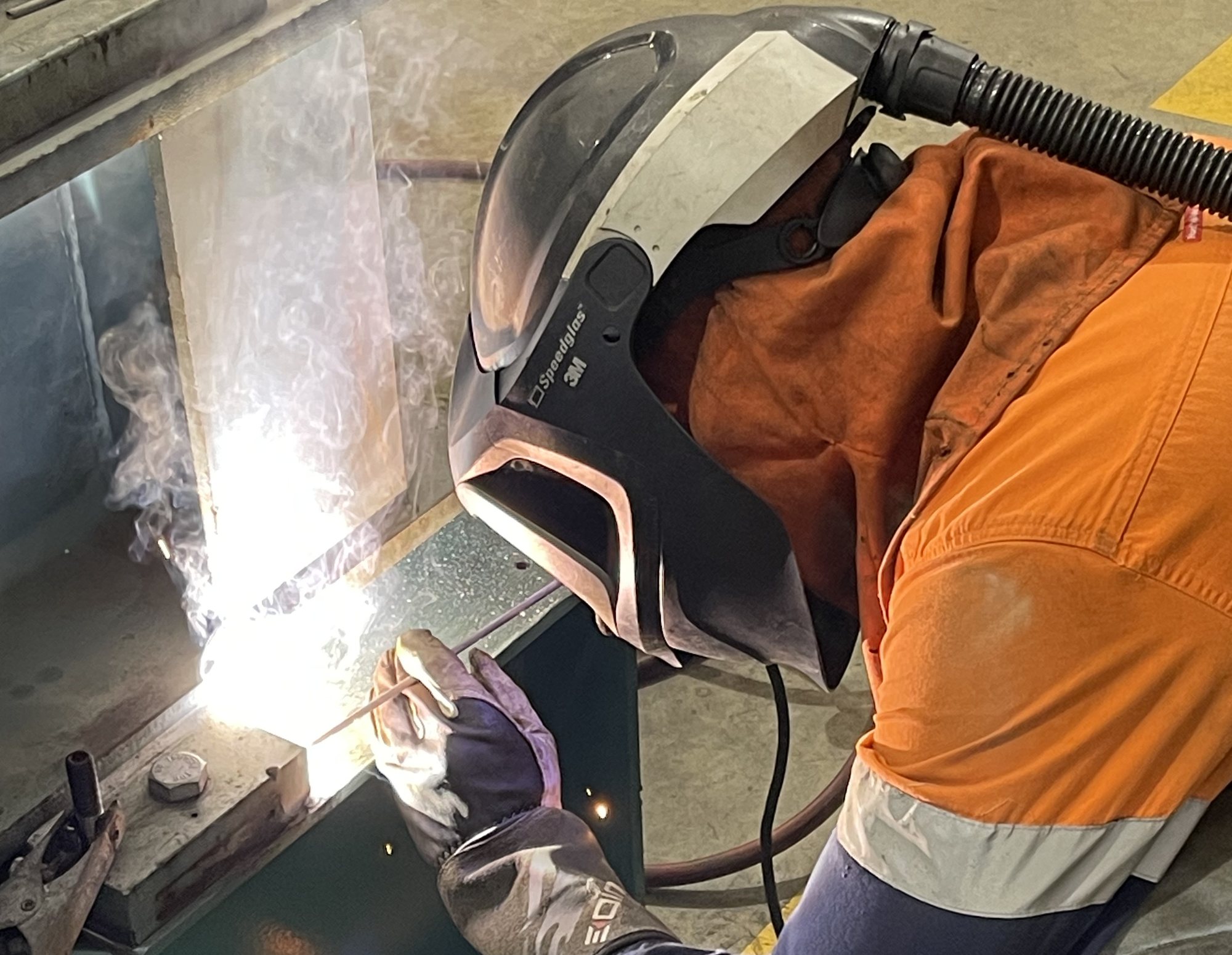 Savage Industries boilermaker welding steel in the Mackay workshop