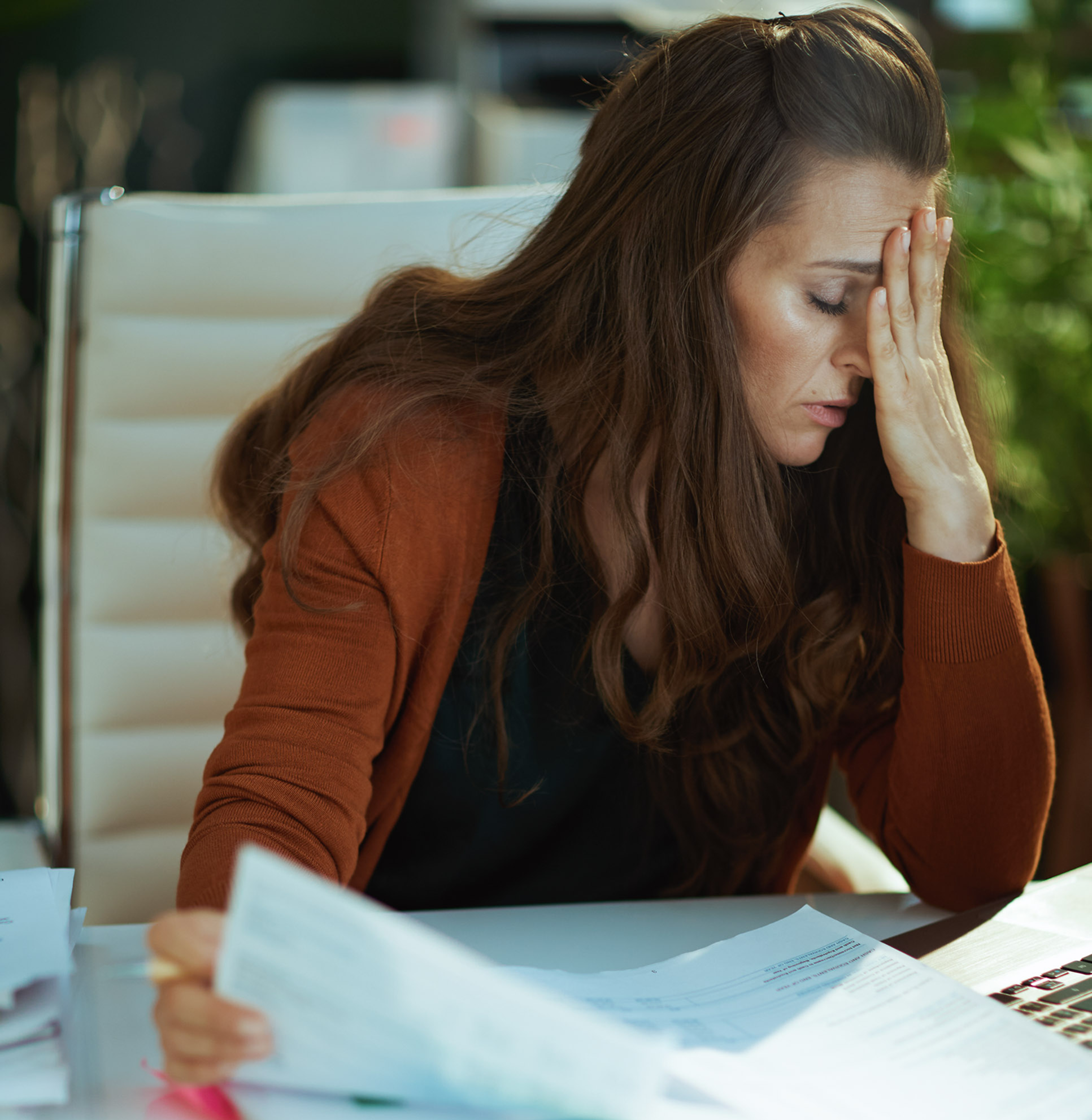 Illustration of a business owner feeling overwhelmed by a messy QuickBooks file