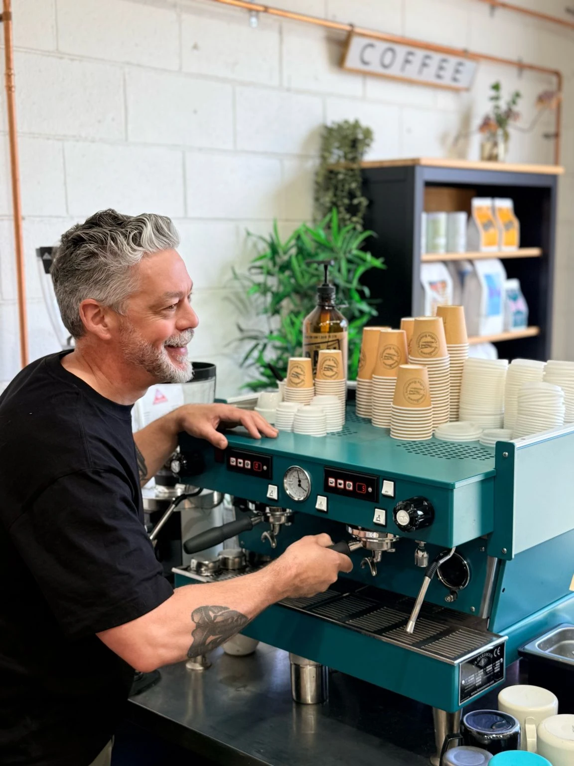 James from Smalltown Coffee working the espresso machine