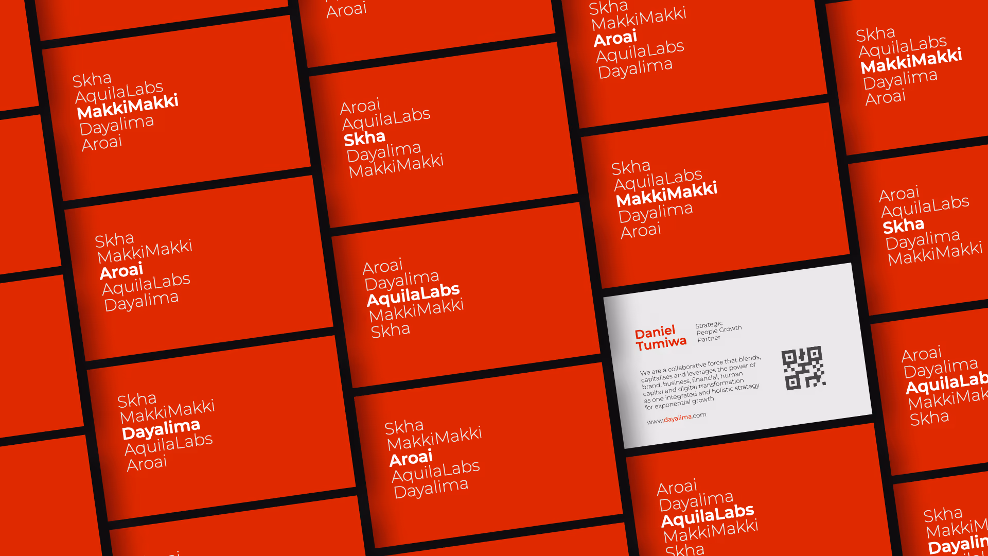 A grid of business cards with a red background featuring names like Skha, MakkiMakki, Aroai, AquilaLabs, and Dayalima in white and bold text, with one white card displaying the name Daniel Tumia, his title as Strategic People Officer, contact details, a QR code, and the website www.dayalima.com.