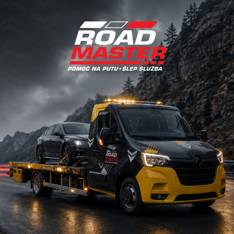 Yellow-black tow truck carrying a black car on a wet mountain road under dark cloudy sky.