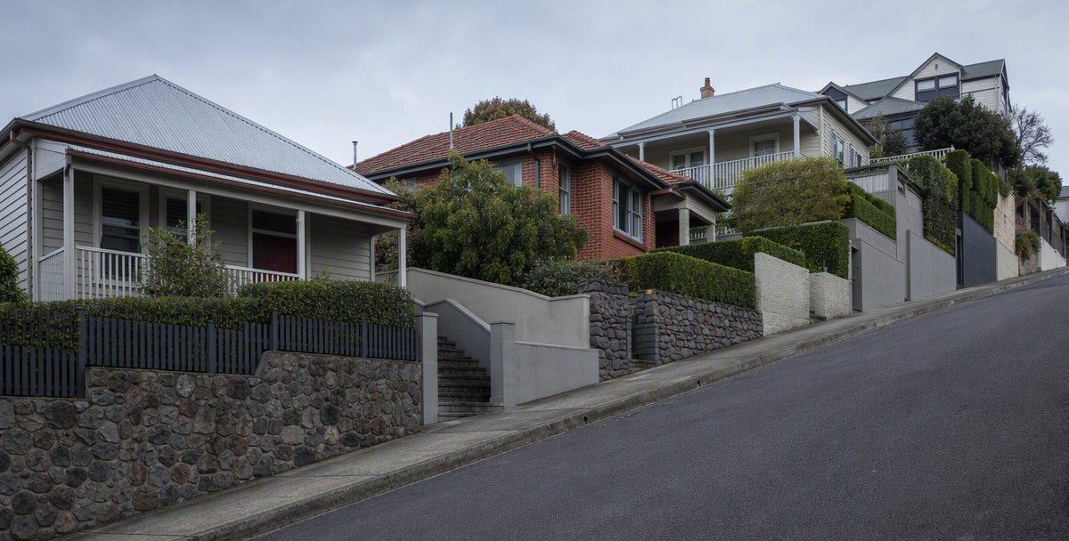 Homes stepping up a hillside Australian street one aer another, reflecting the structure , sequence , team and destination a property advisor holds together.