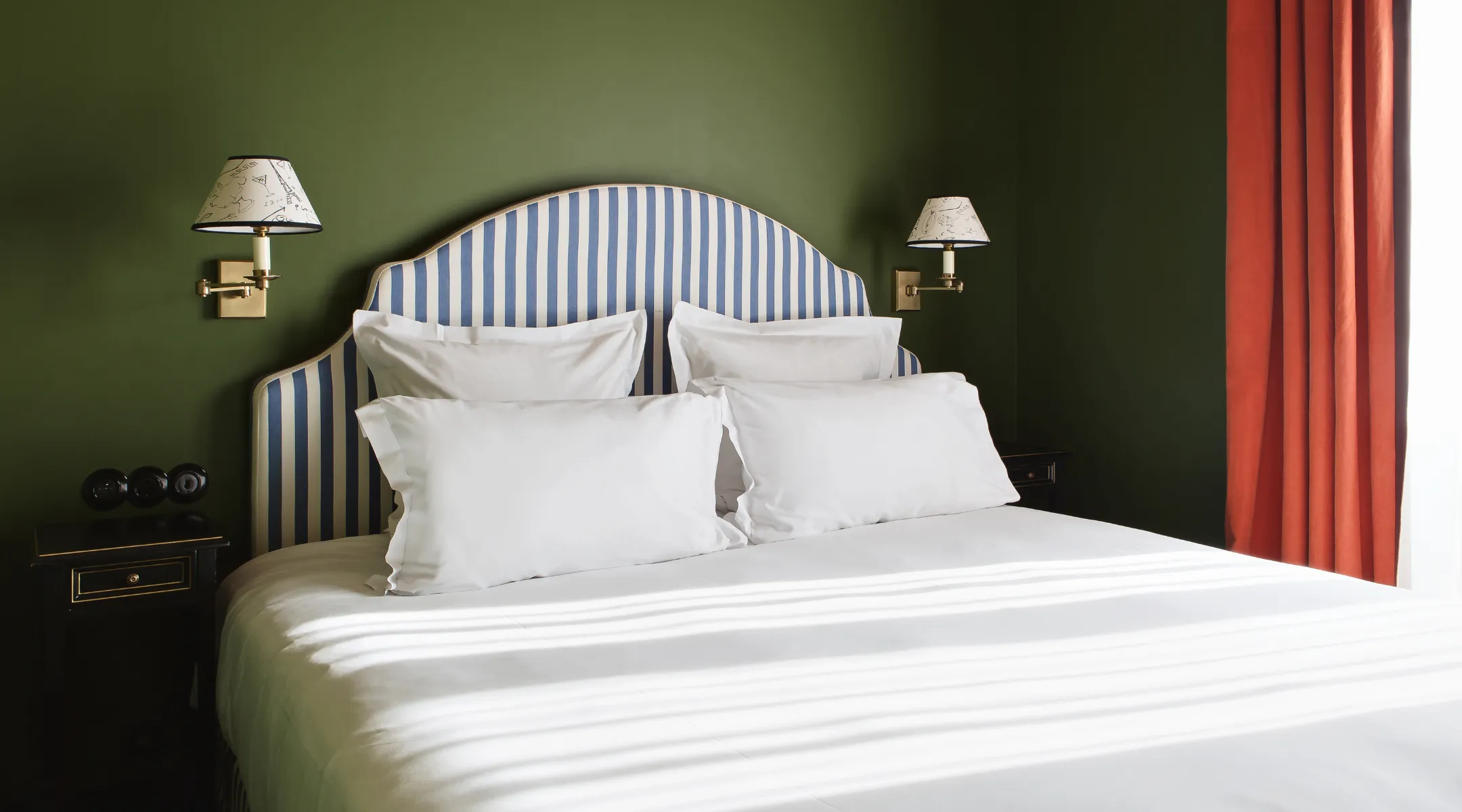 Interior design of a guest room at the Hôtel des Deux Gares in Paris.