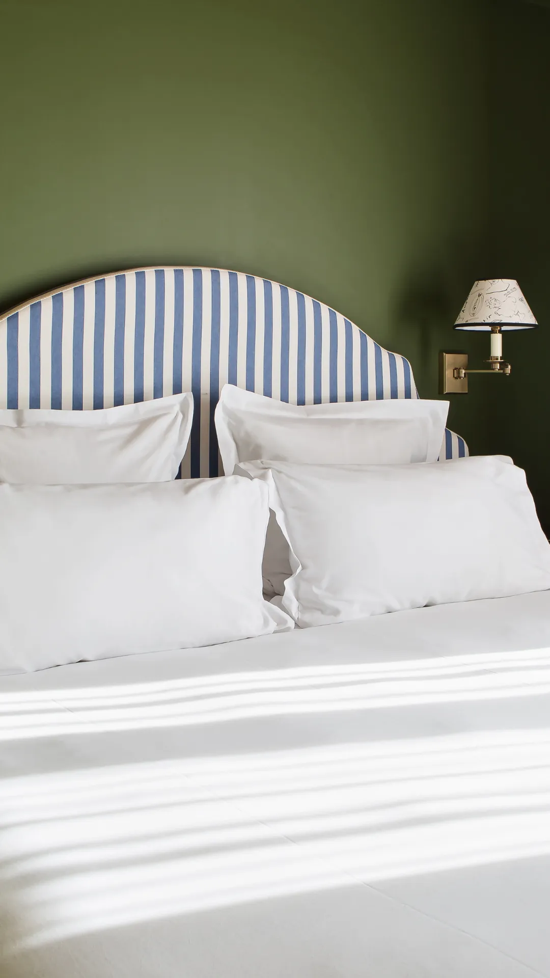 Interior design of a guest room at the Hôtel des Deux Gares in Paris.