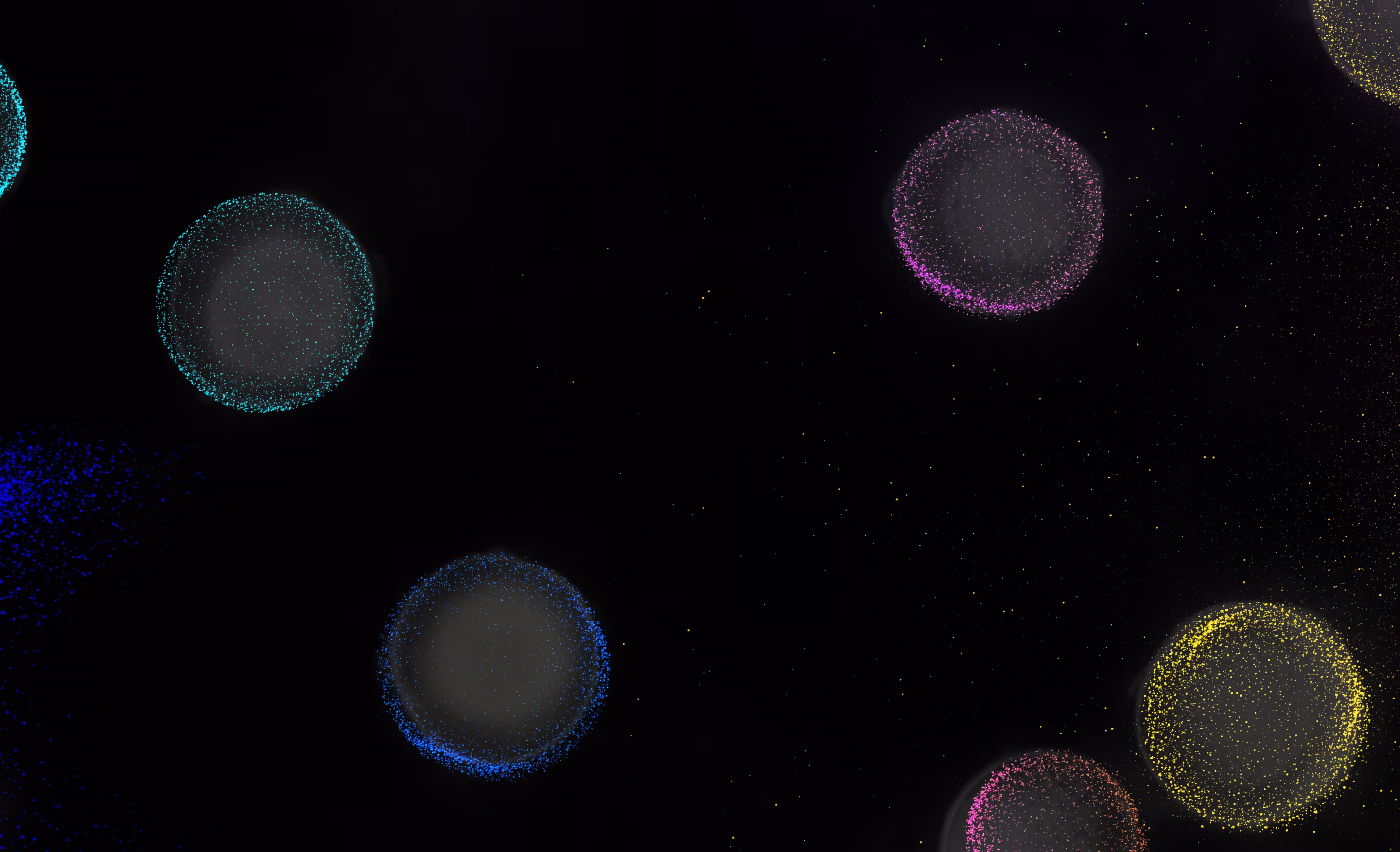 Dark background with floating colorful glowing orbs of blue, pink, yellow, and purple dots.