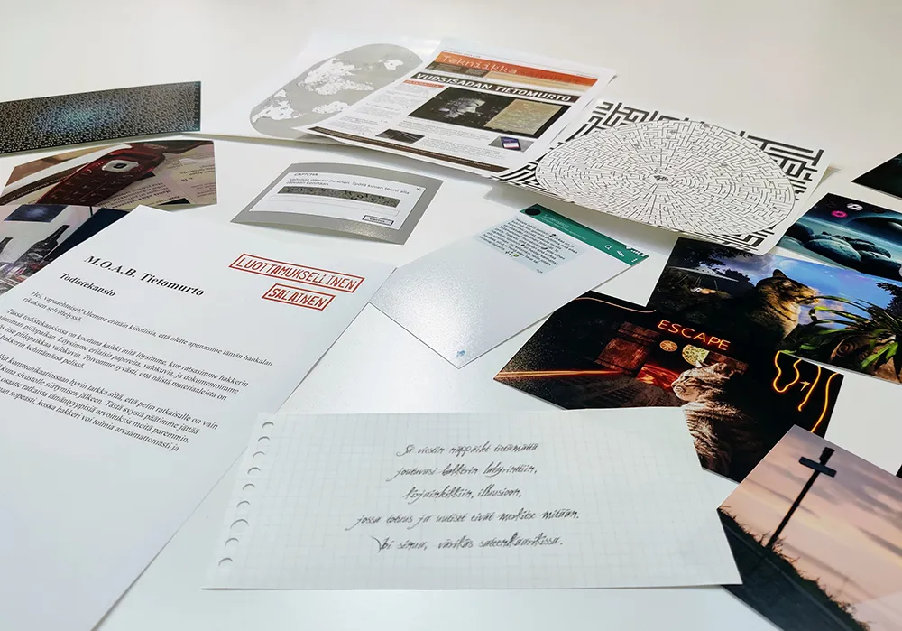 Escape game materials that can be delivered to multiple locations for a hybrid event