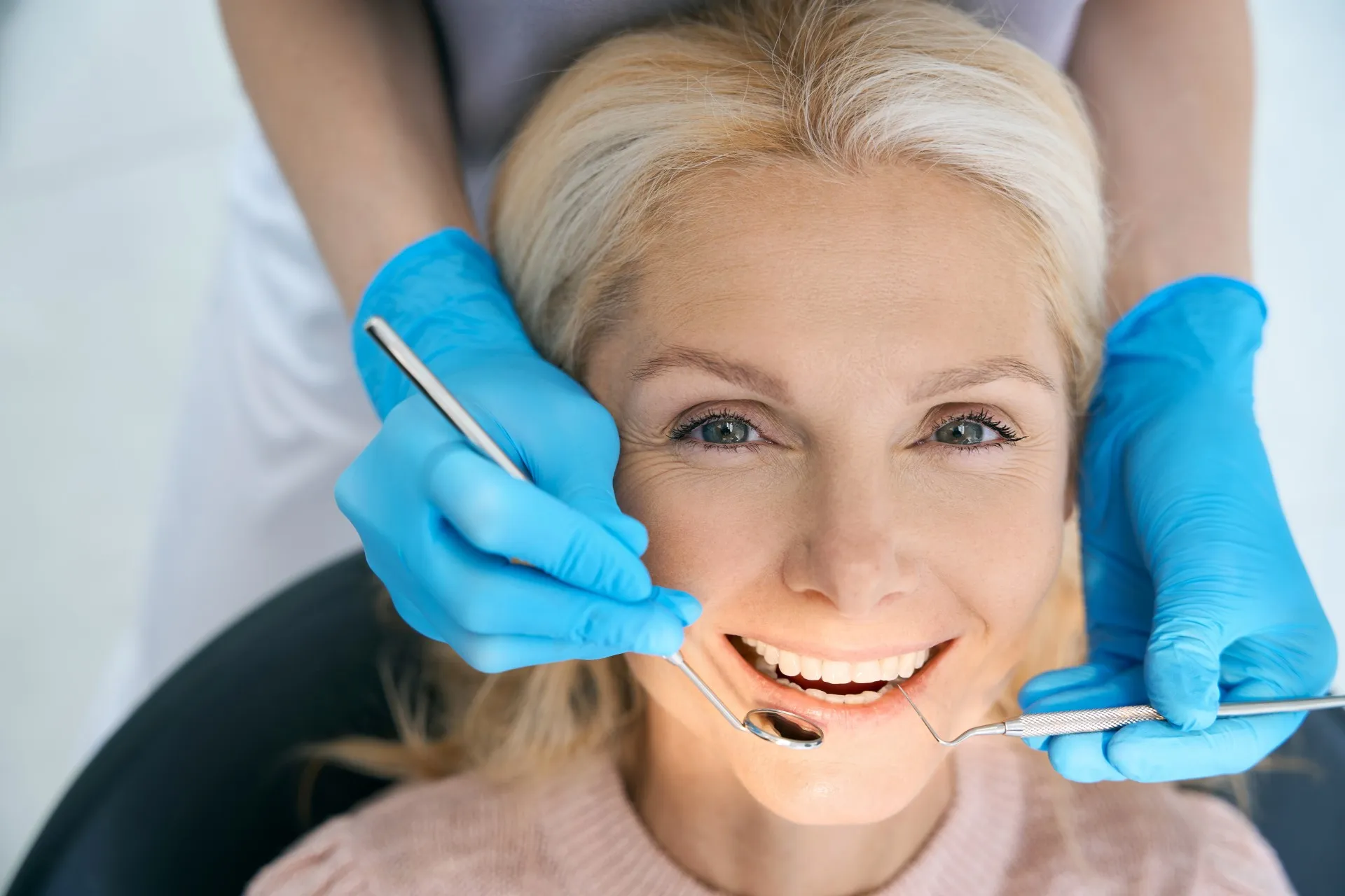 Before and after showing a tooth restored with a natural-looking all-ceramic crown