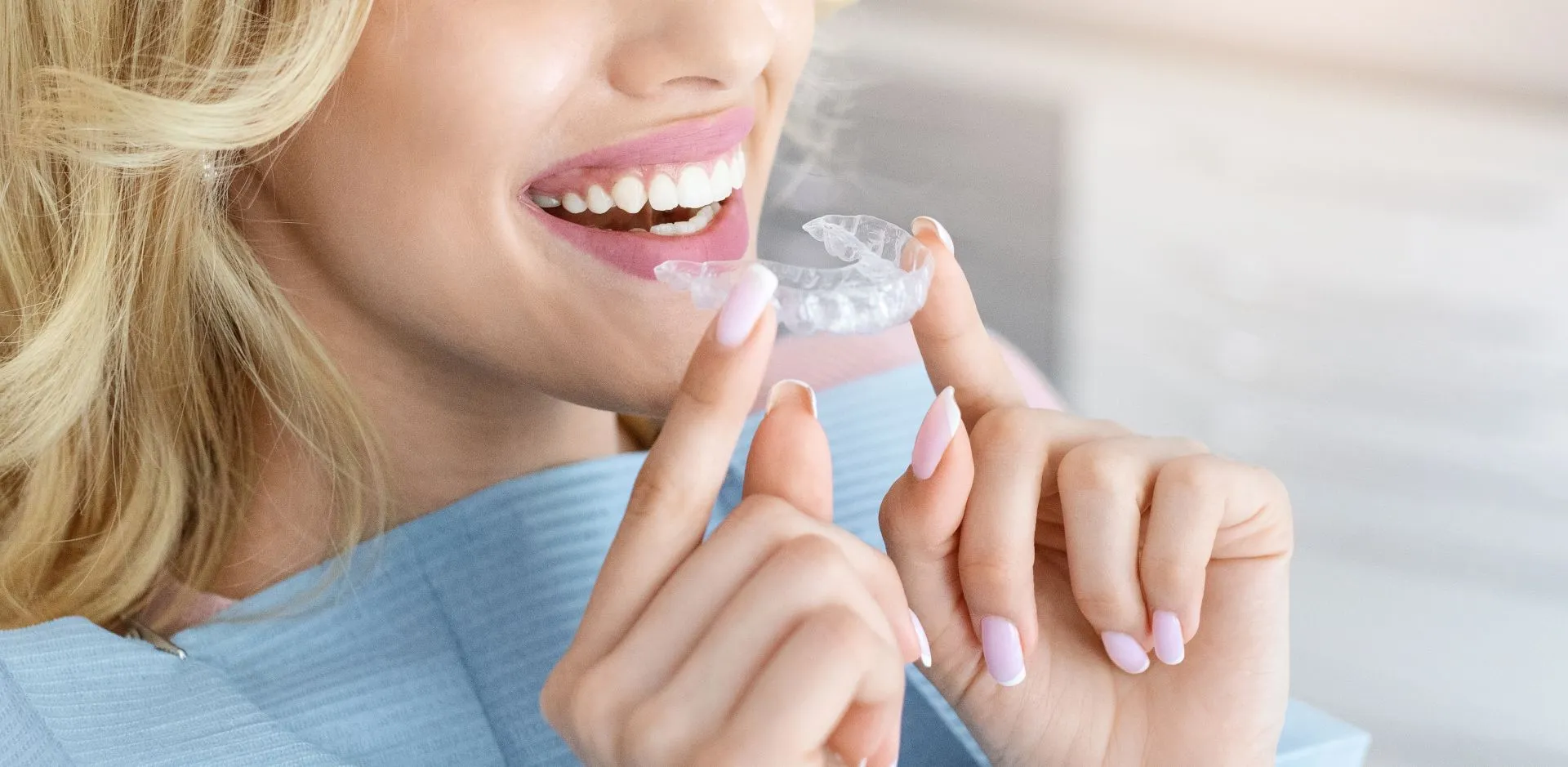 Close-up of Invisalign clear aligner trays showing their nearly invisible, removable design