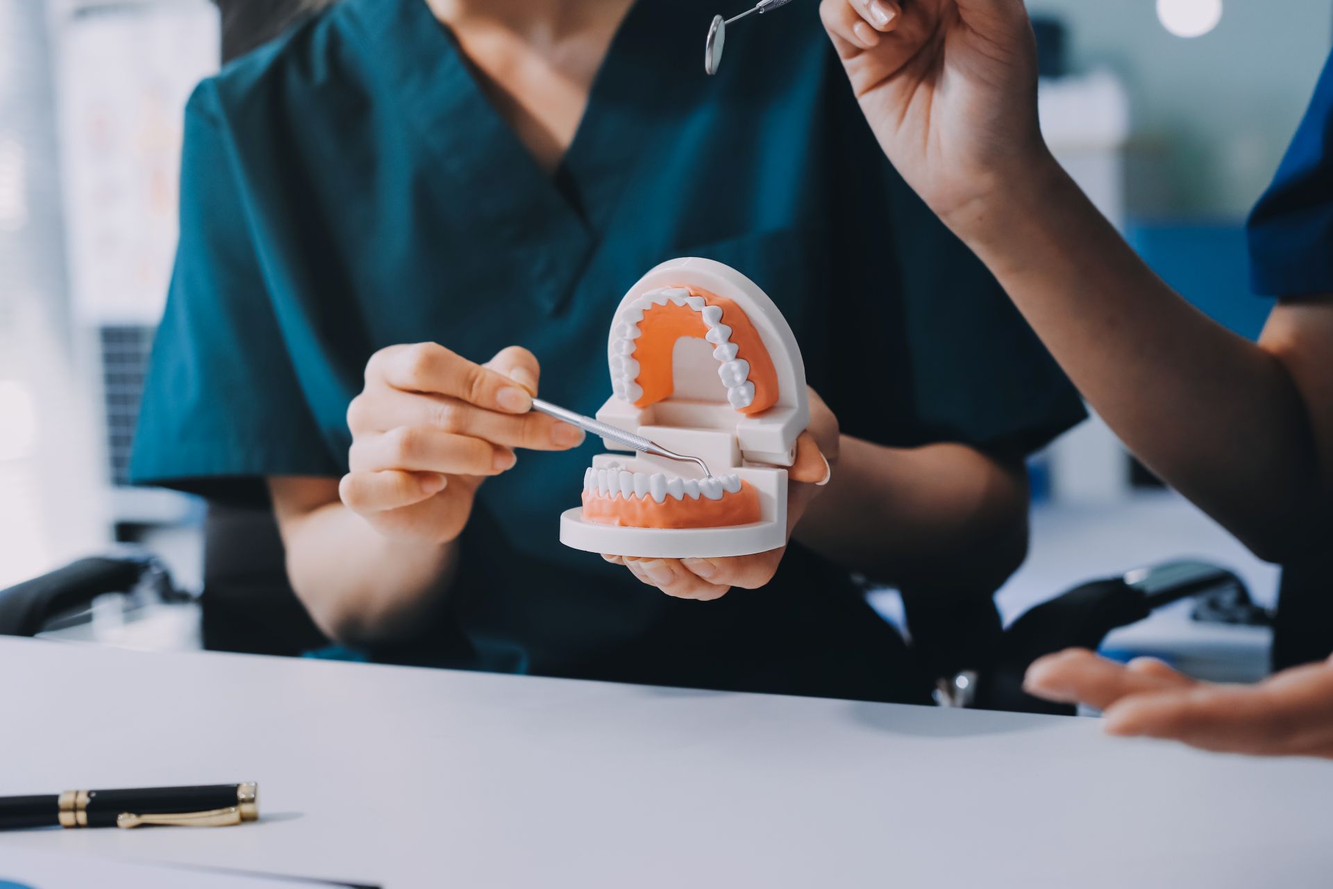 Dentist reviewing a 3D implant placement plan for a full-arch restoration at Nova Dental Care of Vienna