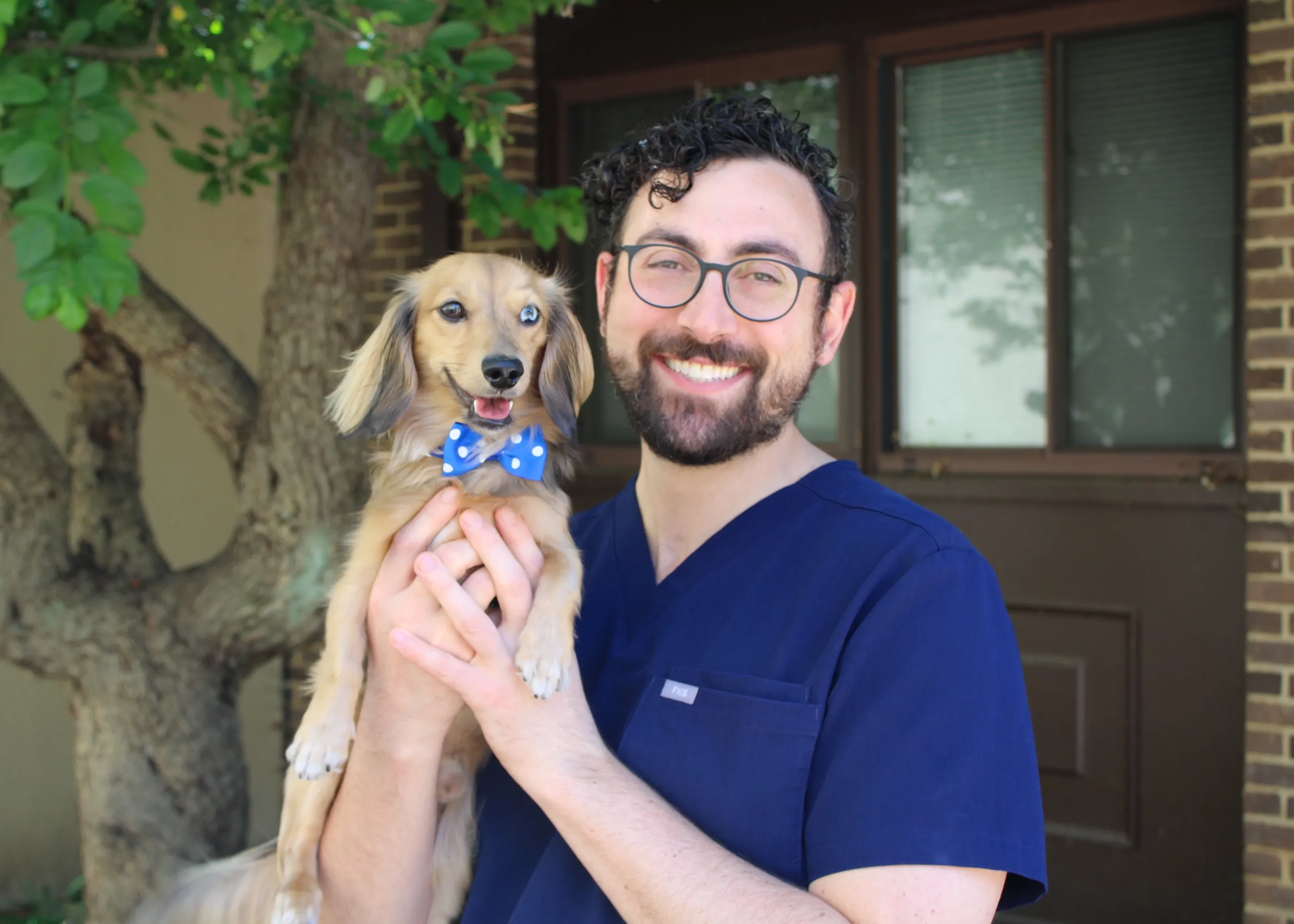 Dr. Marcus Emad with his dog — Nova Dental Care of Chantilly