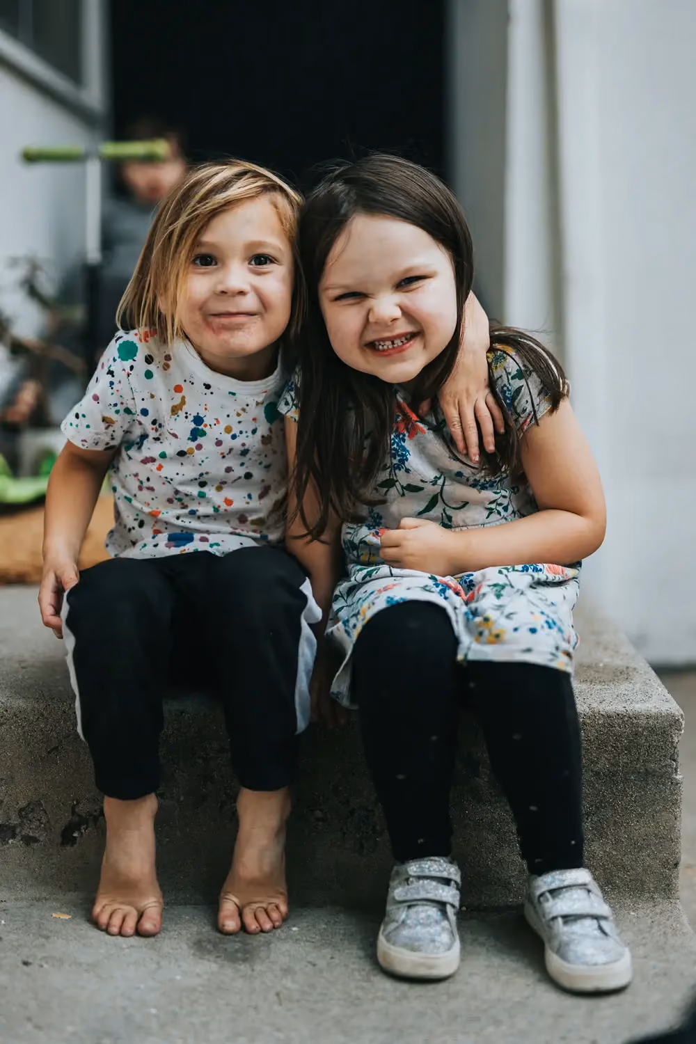 Two children sitting together, stock image