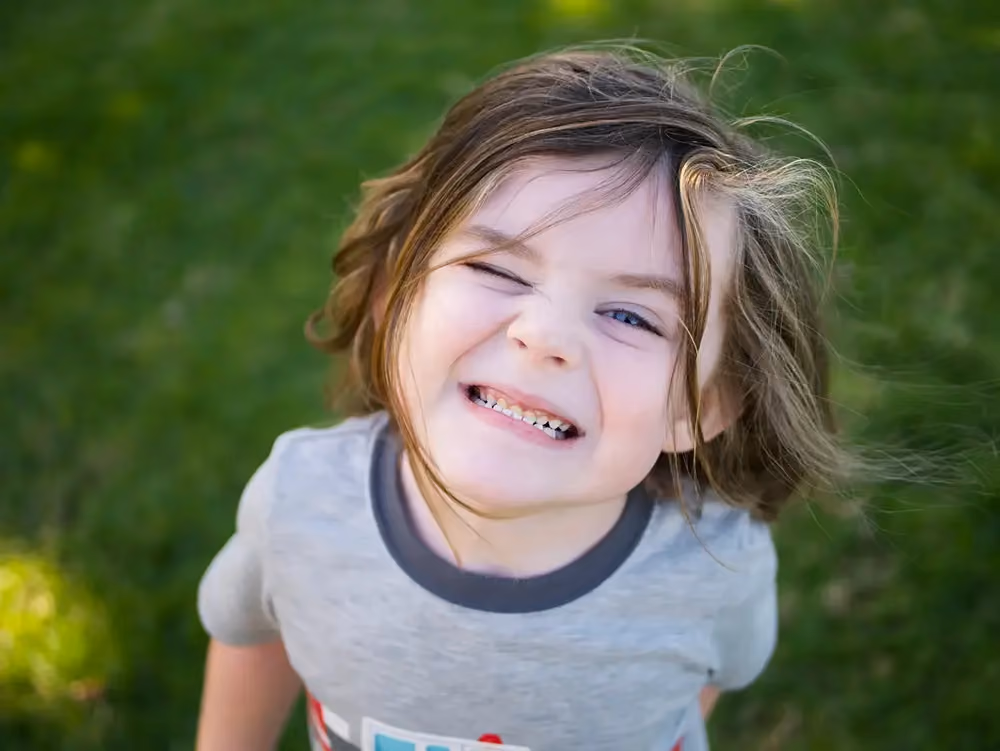 Child grinning, stock image