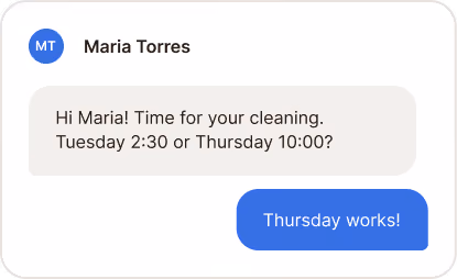 Chat conversation where Maria Torres confirms Thursday 10:00 for cleaning appointment.