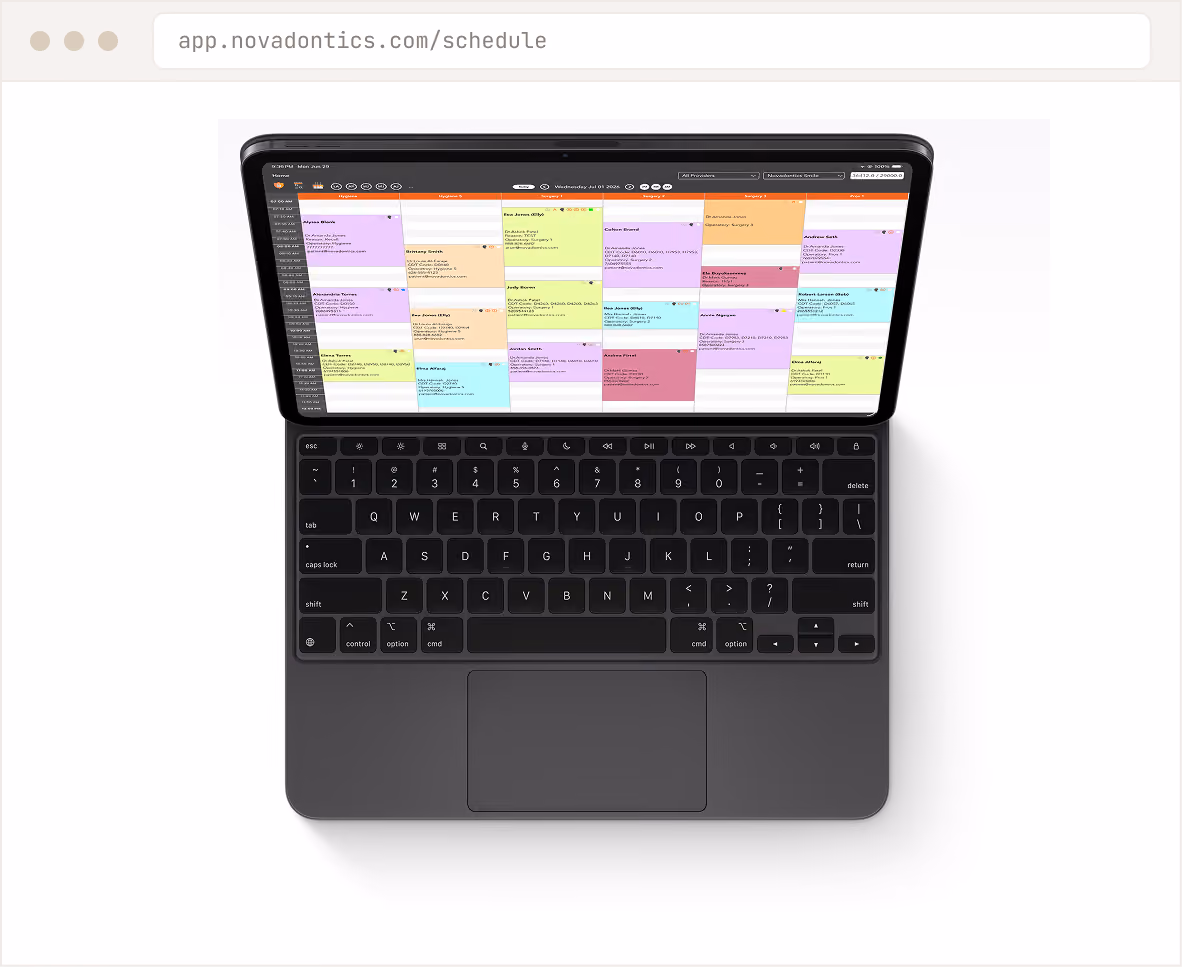 Laptop with a colorful week calendar schedule open on screen showing appointments and times.