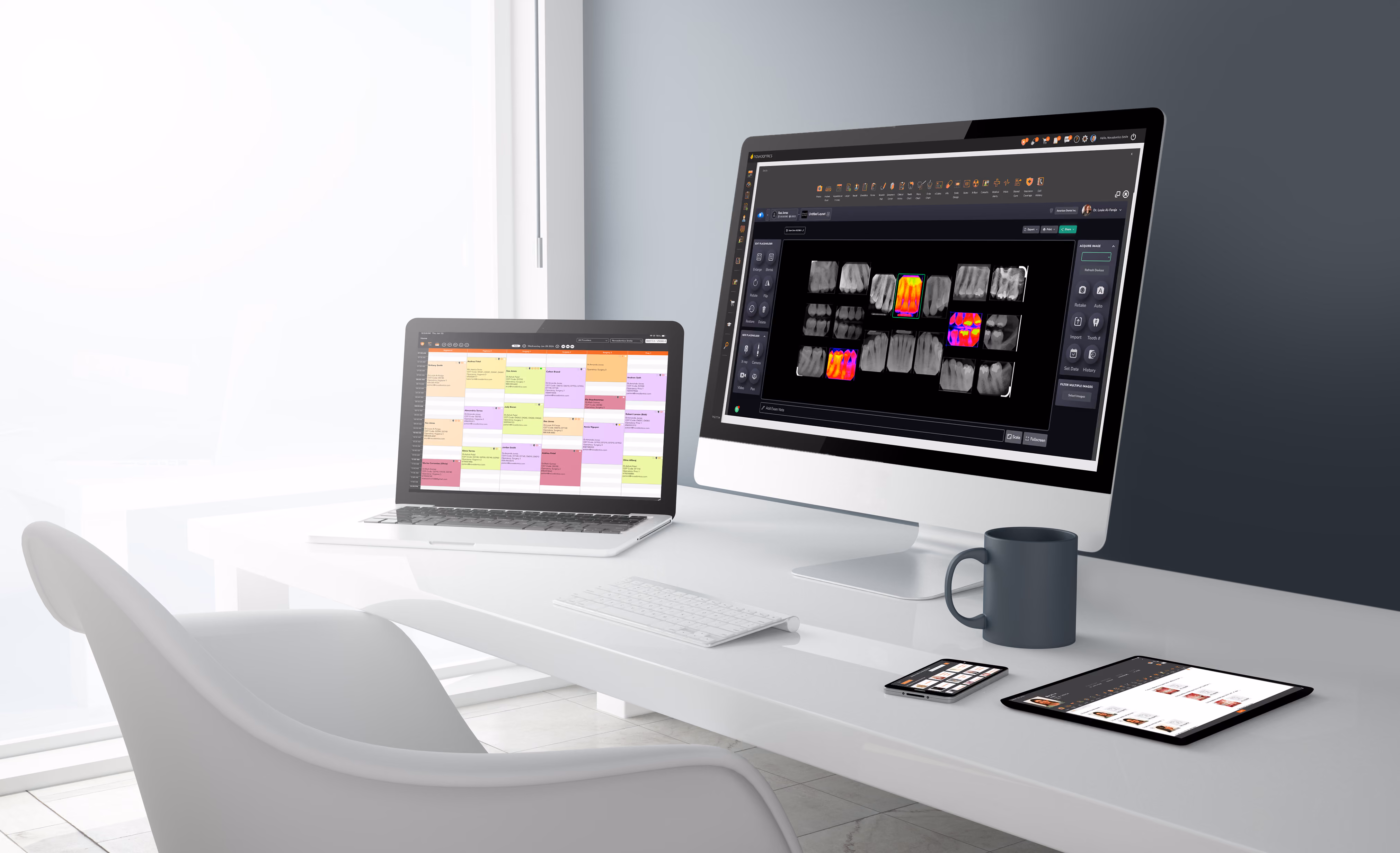 Modern office desk with a white chair, laptop, desktop showing dental x-rays, tablet, phone, and mug.