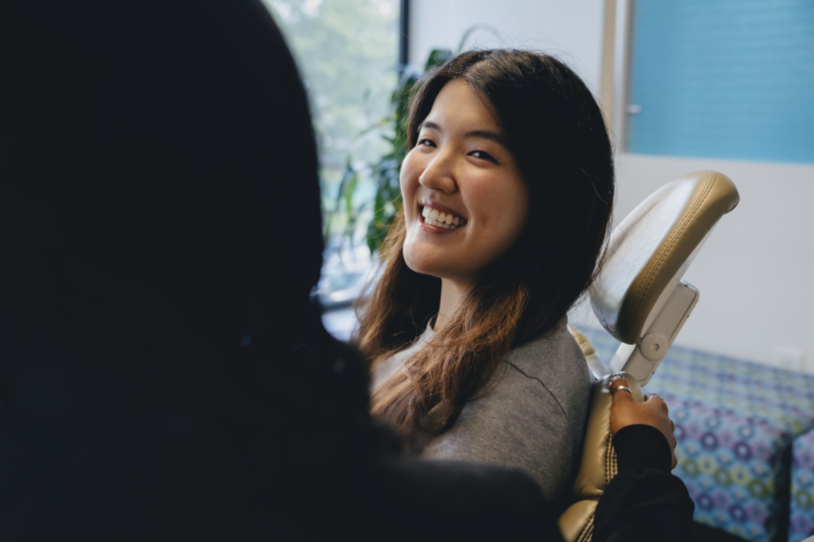 Atlanta dental implant restoration female patient showing at Dentistry by Design