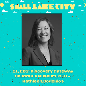 Black and white portrait of Kathleen Bodenlos, CEO of Discovery Gateway Children’s Museum, smiling and wearing a blazer, framed by a teal background with yellow text reading 'SMALL LAKE CITY' and episode information below.