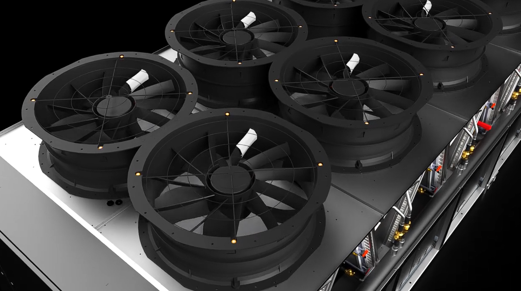 Close-up of multiple black industrial cooling fans mounted on metal machinery.