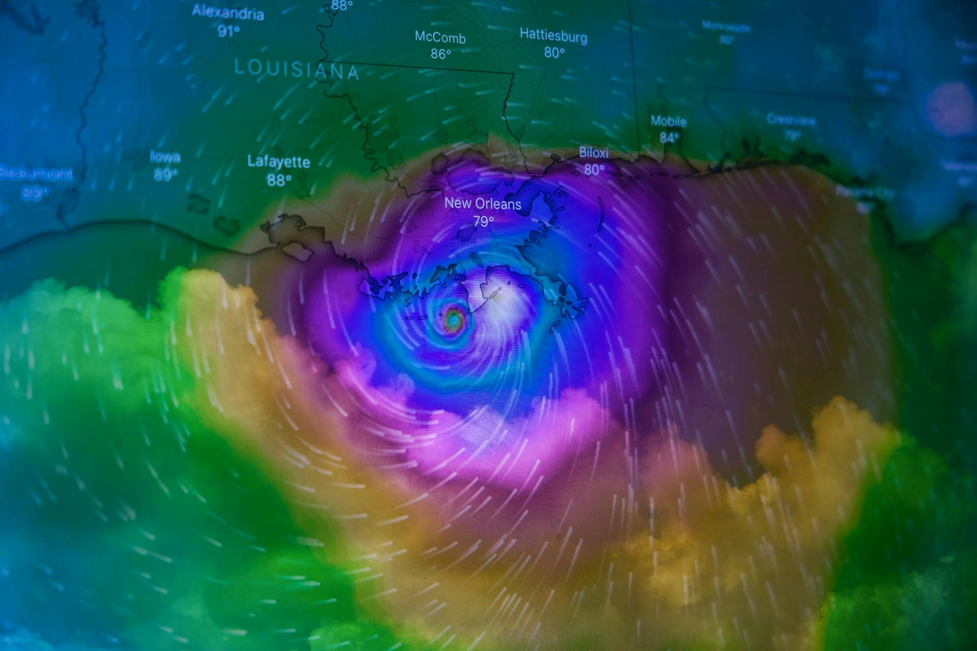 Weather map showing a hurricane near the Louisiana coast, south of New Orleans.