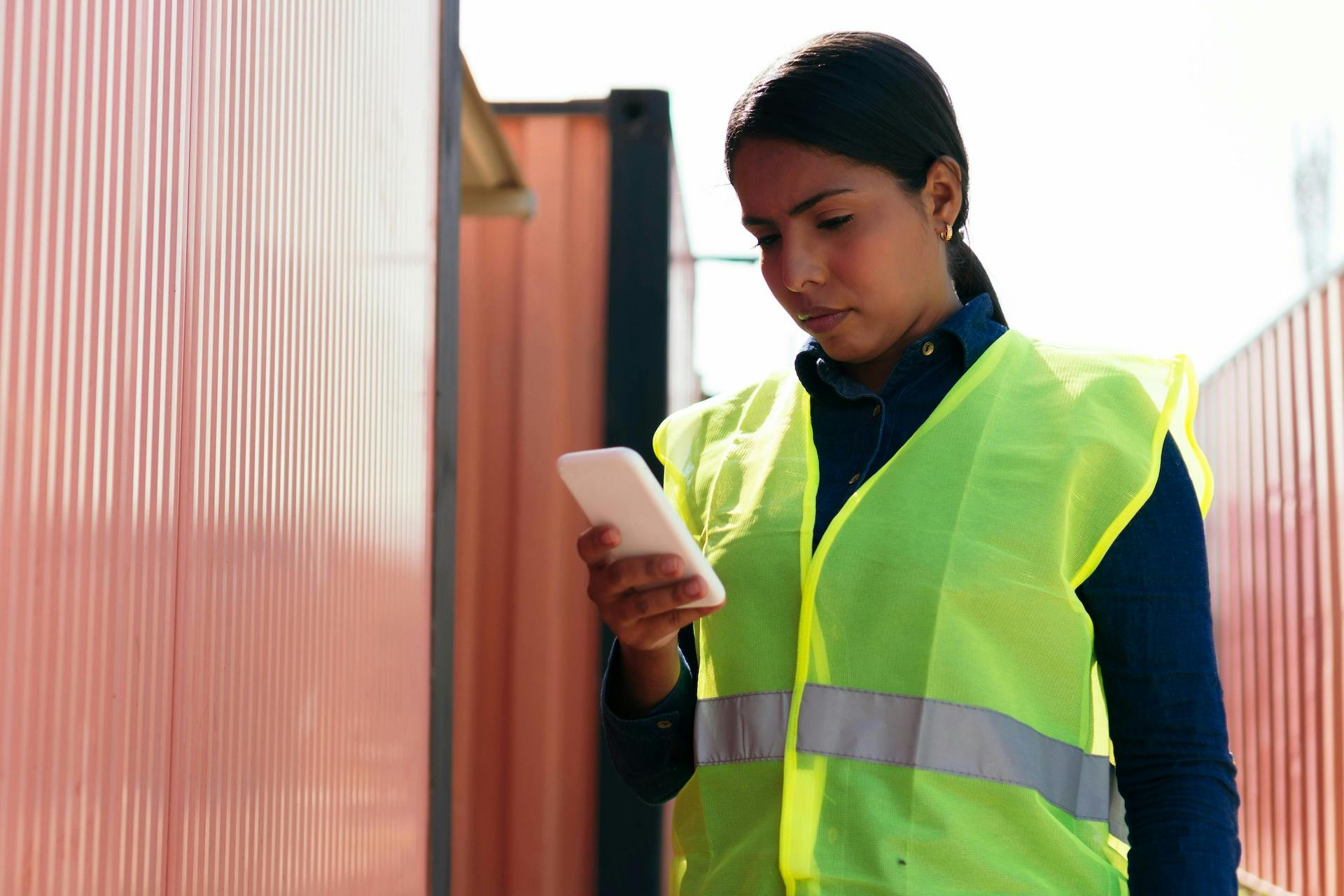 worker looking at the phone