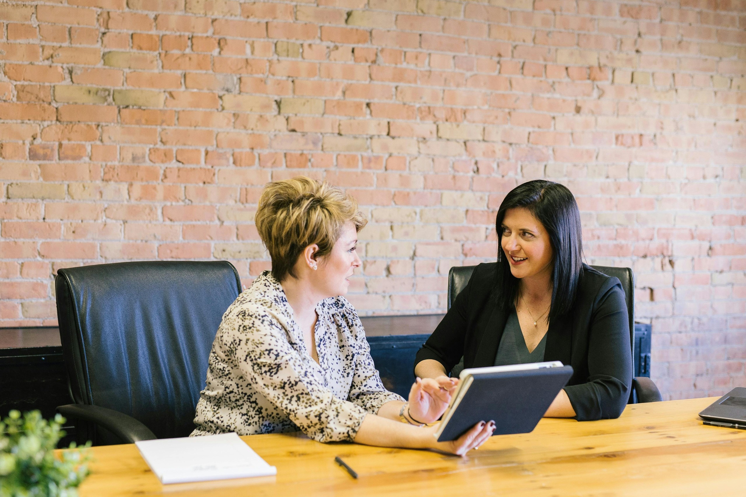 HR leaders discussing workforce strategy at a table
