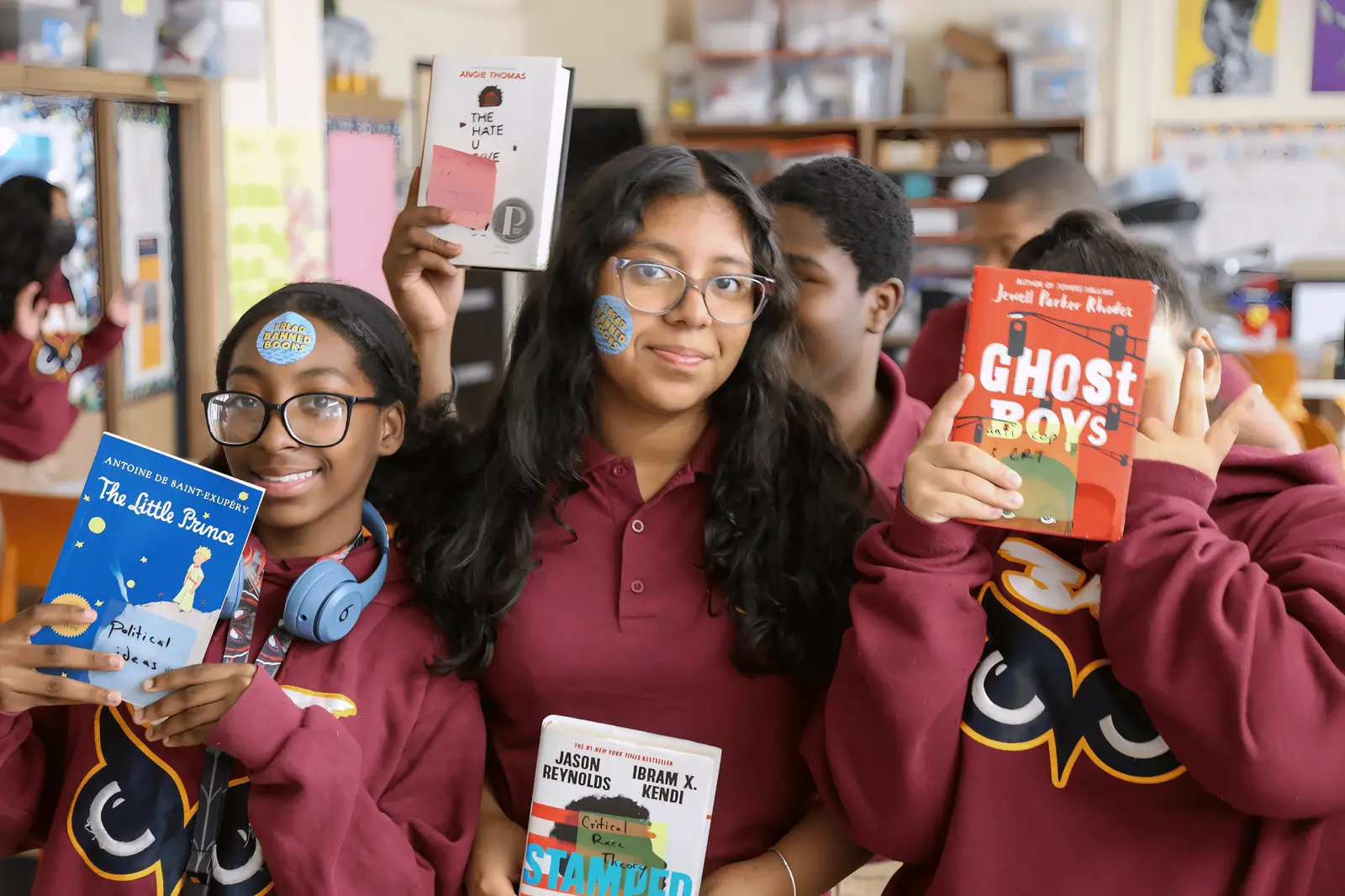 Students proudly display banned books including Ghost Boys and The Little Prince