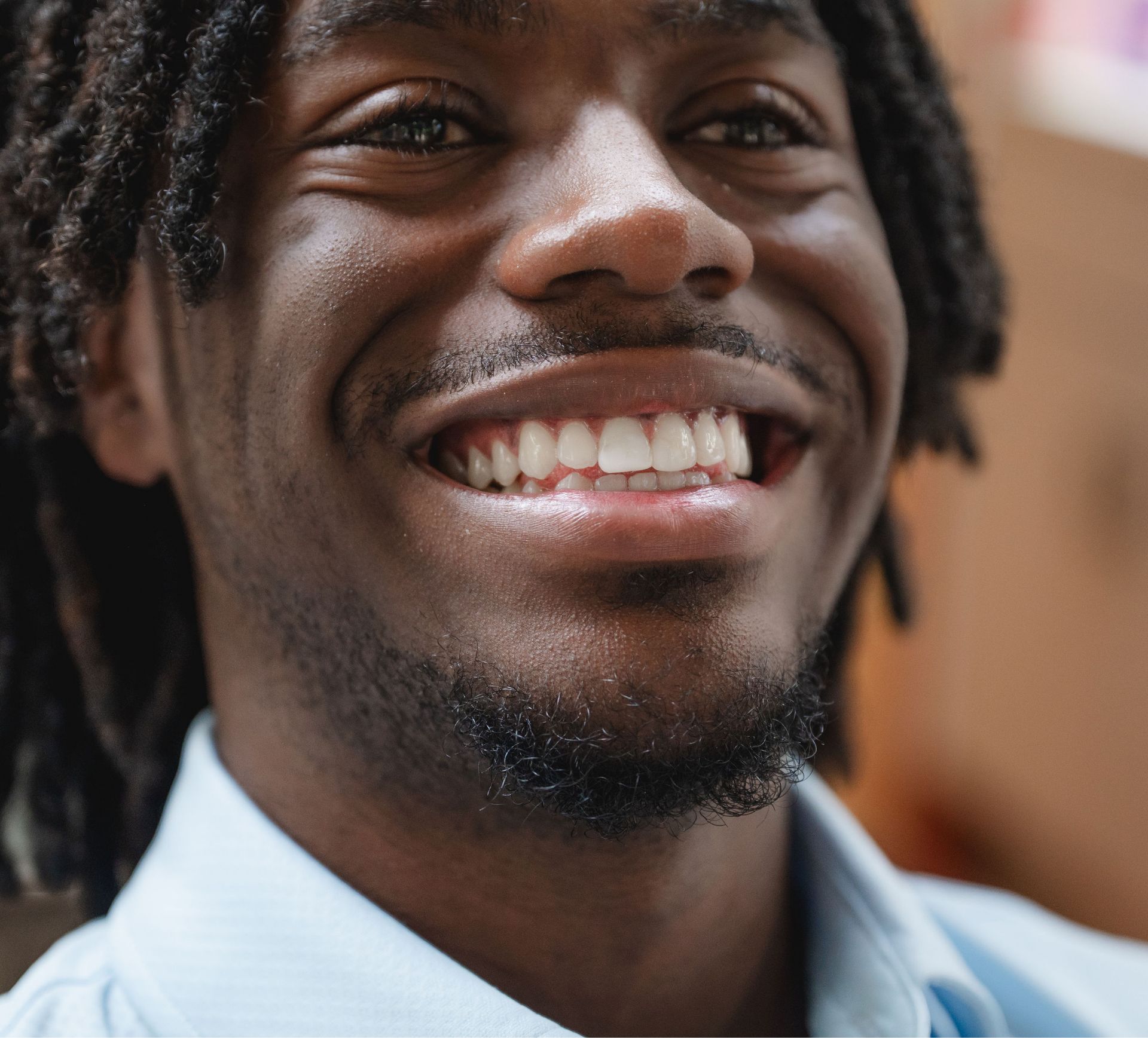 Close-up portrait of a smiling patient.