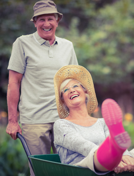 Older couple happy after dental implant treatment in Arlington TX