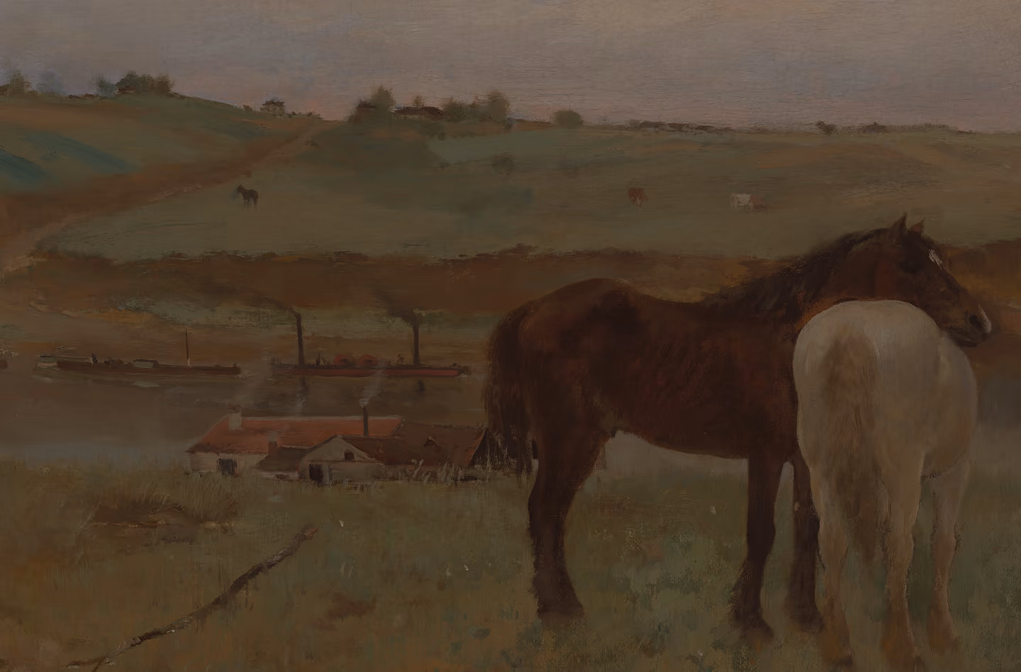 Two horses standing close together in a grassy field with a rural landscape of hills, farm buildings, and a river in the background.