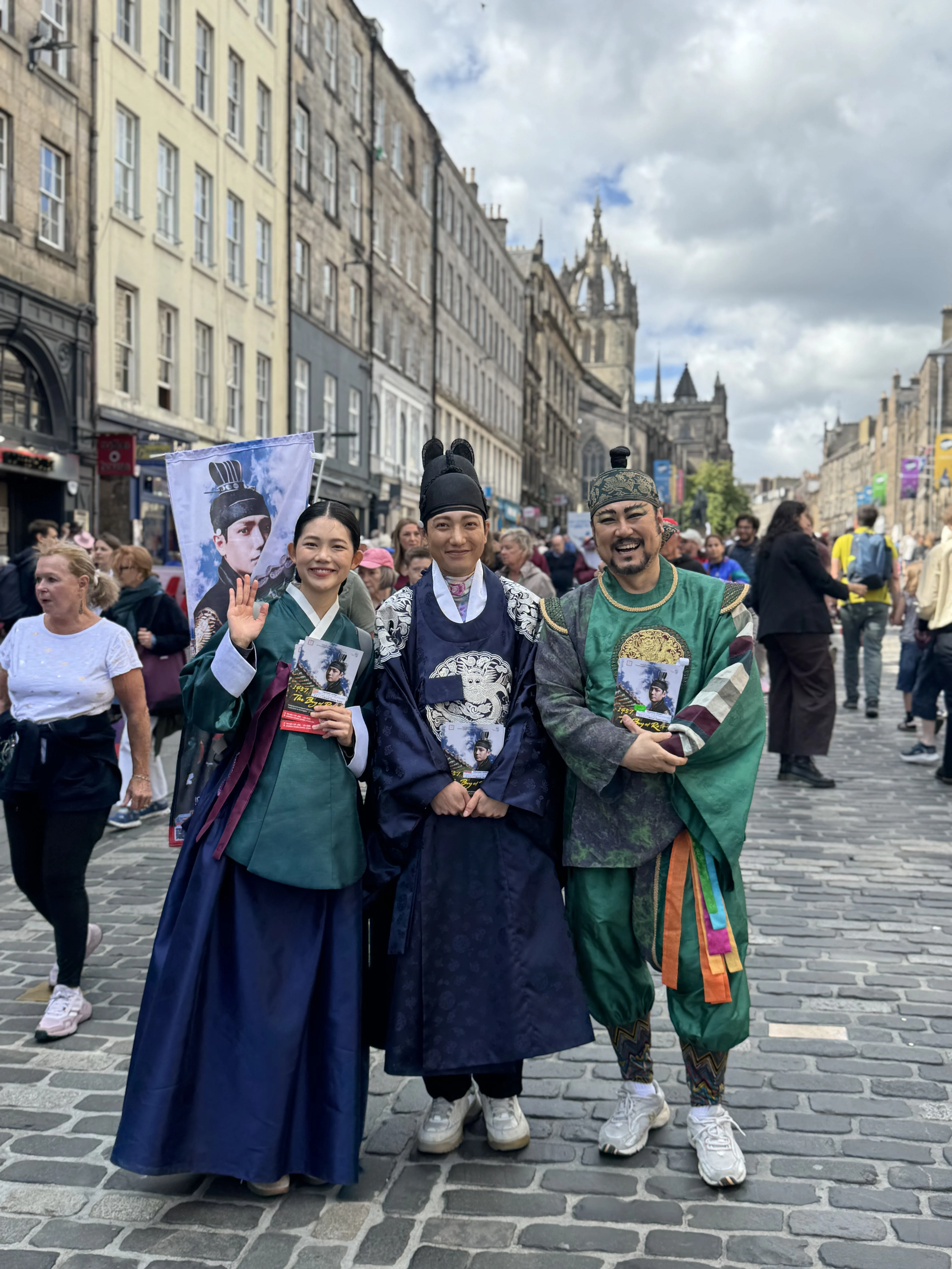 People in costume on Edinburgh's Royal Mile during festival celebration