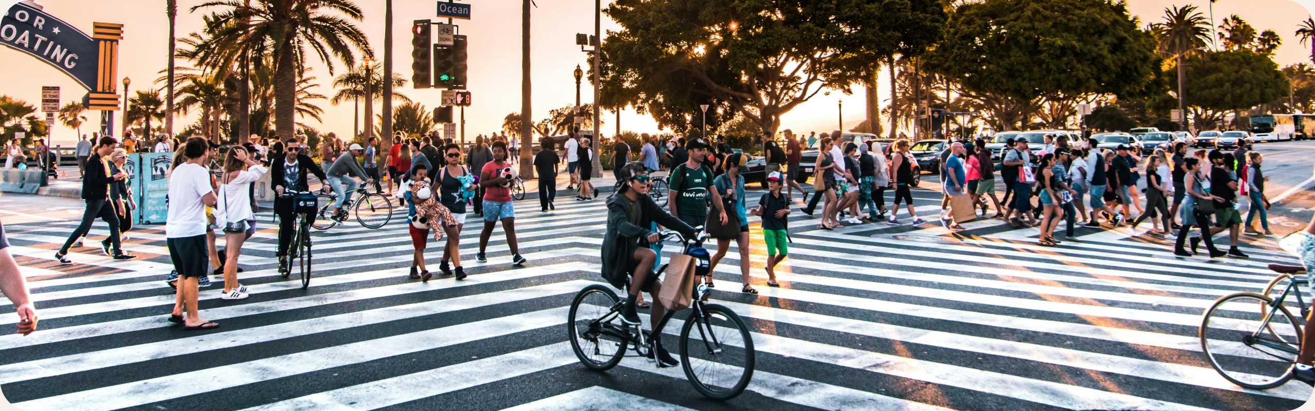 A crowded California crosswalk full of people