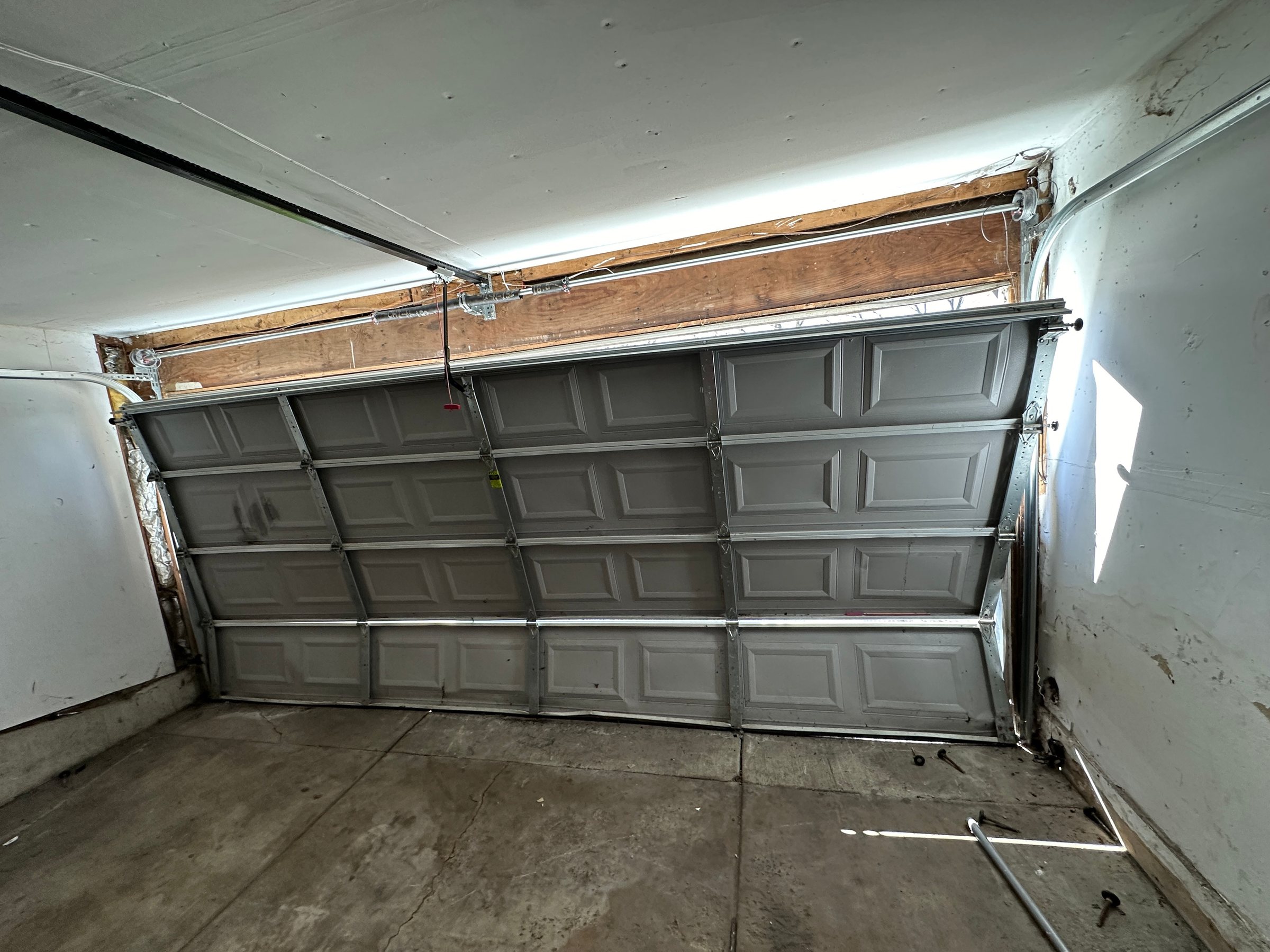 Damaged garage door repair
