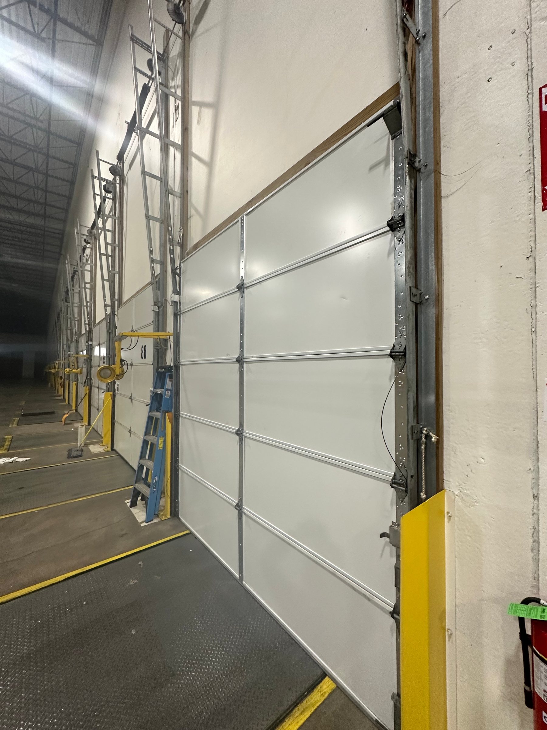 Sectional garage door installation
