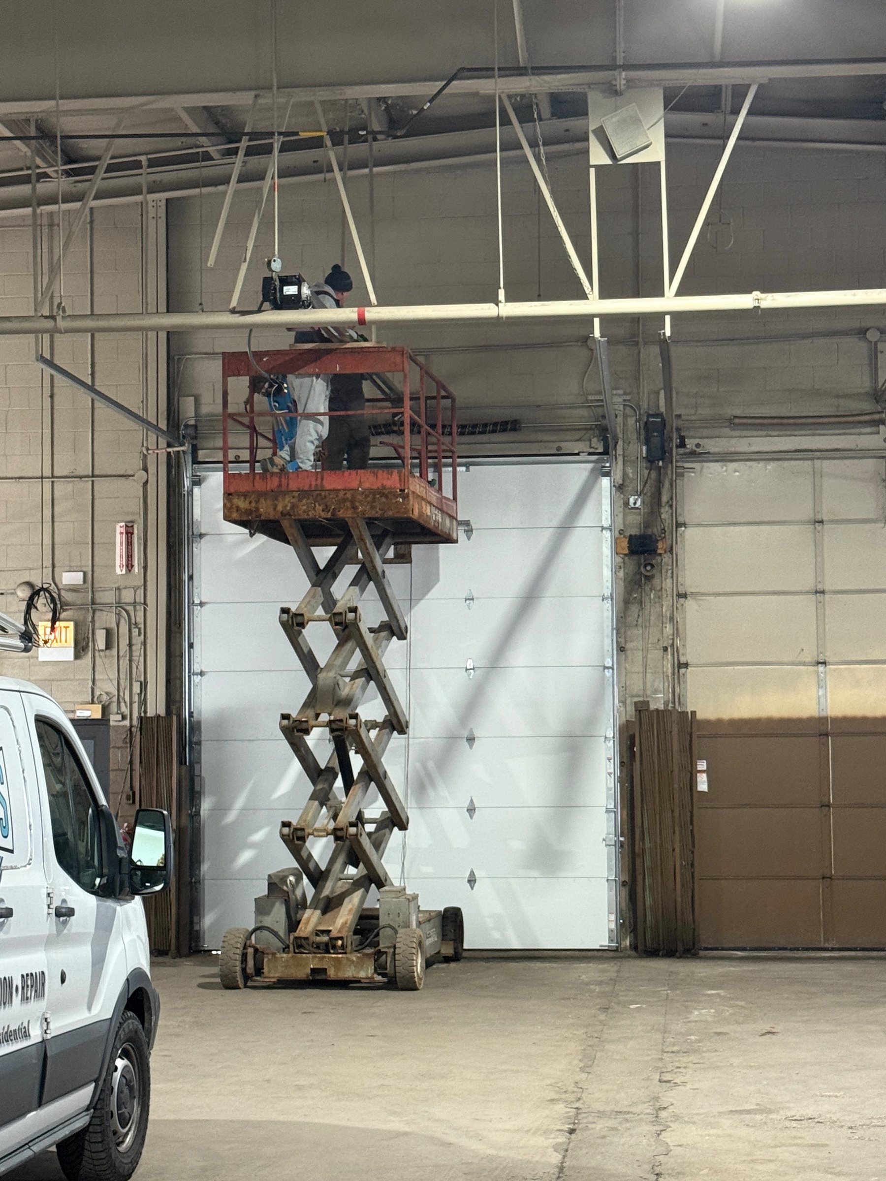 Commercial overhead door lift service