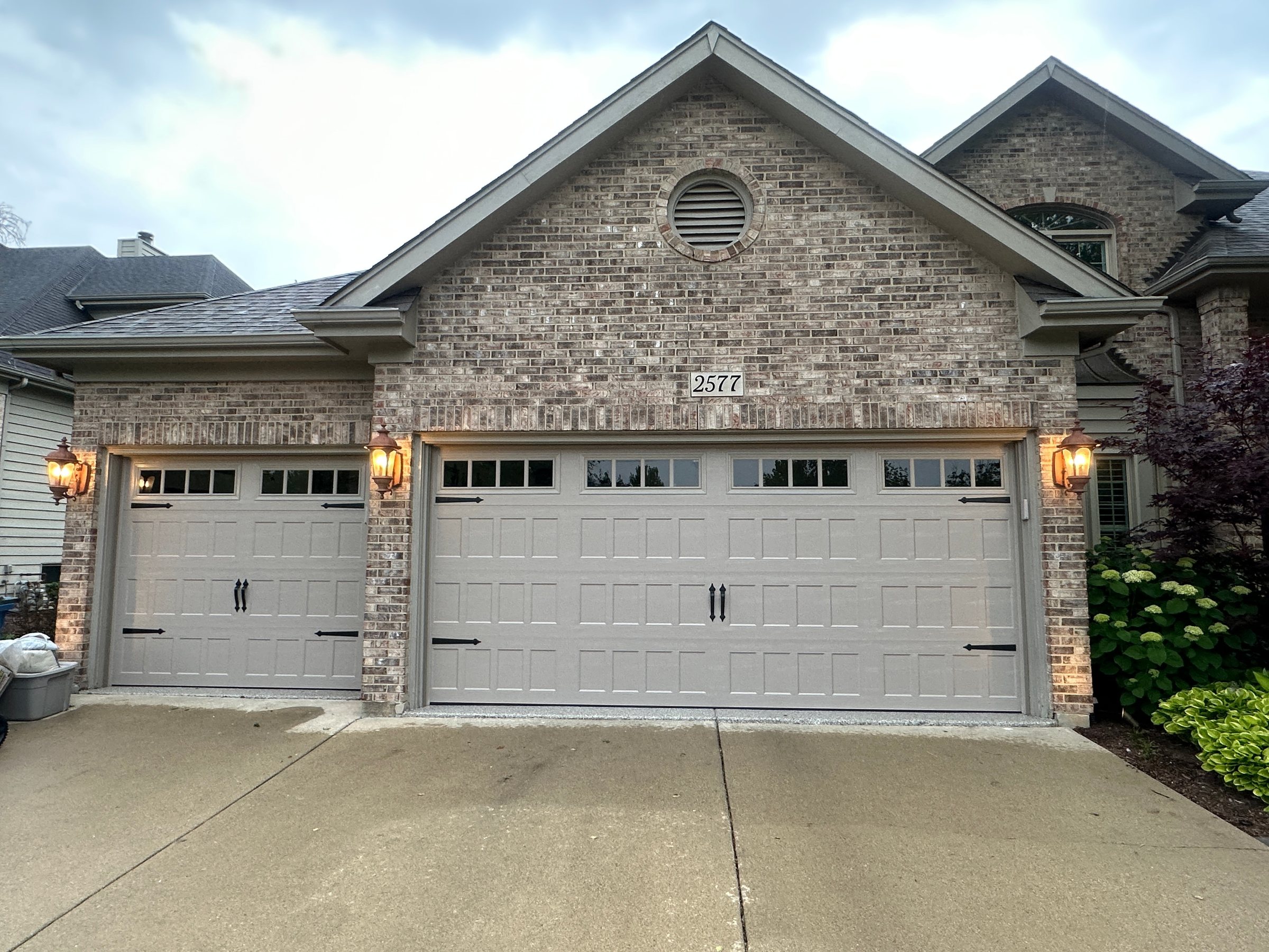 Traditional garage doors installed by 630 OVERHEAD
