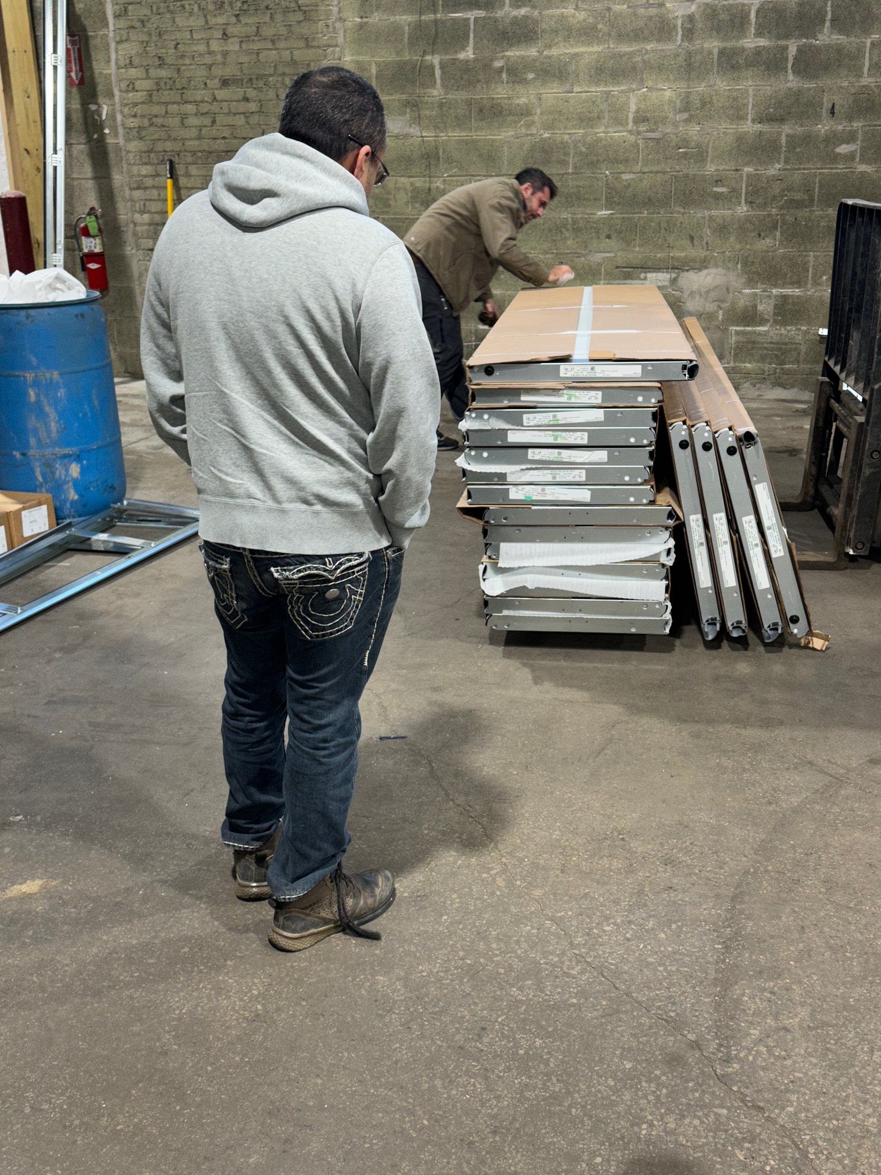 Sectional garage door panel installation
