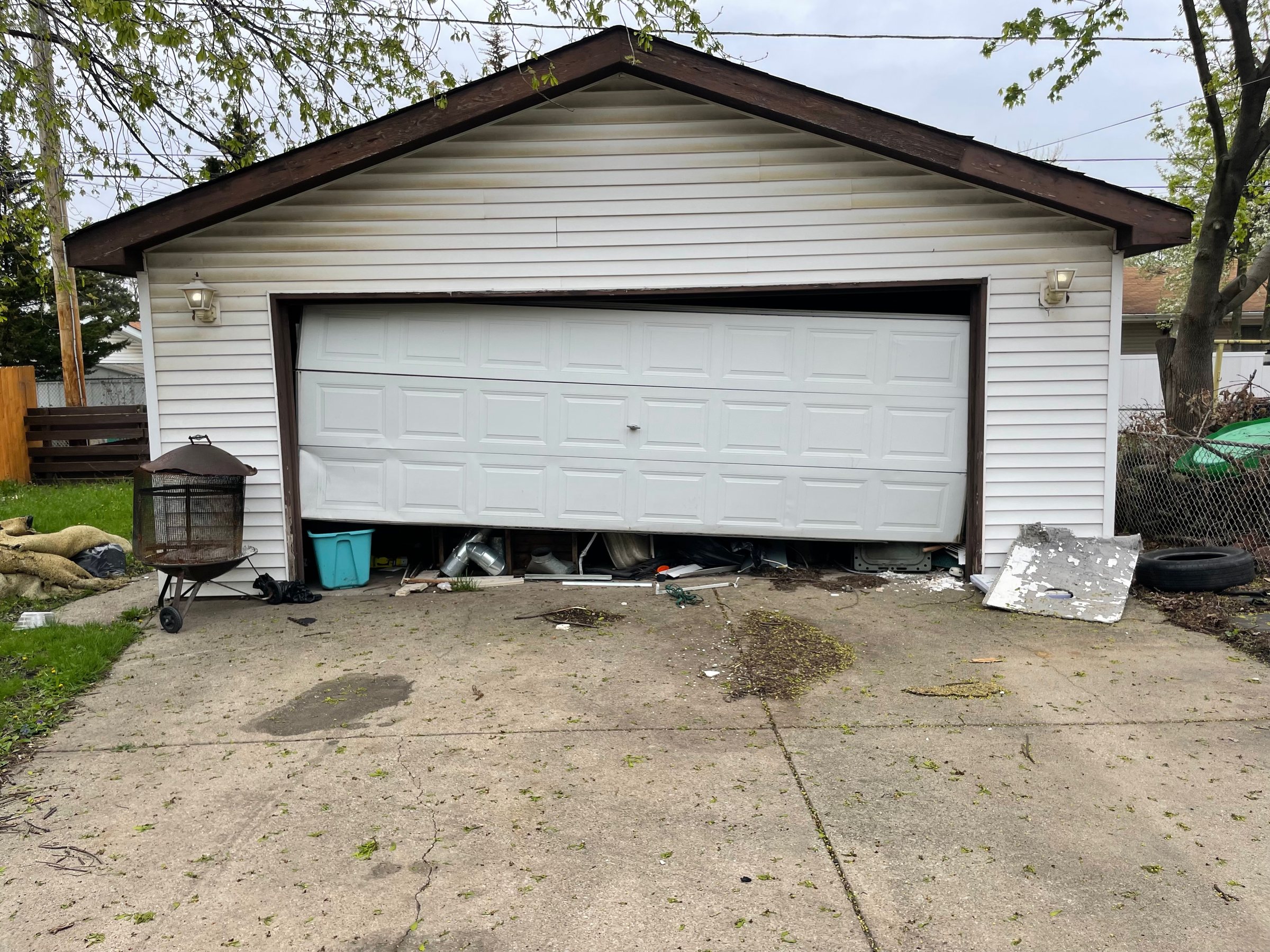 Off-track garage door repair