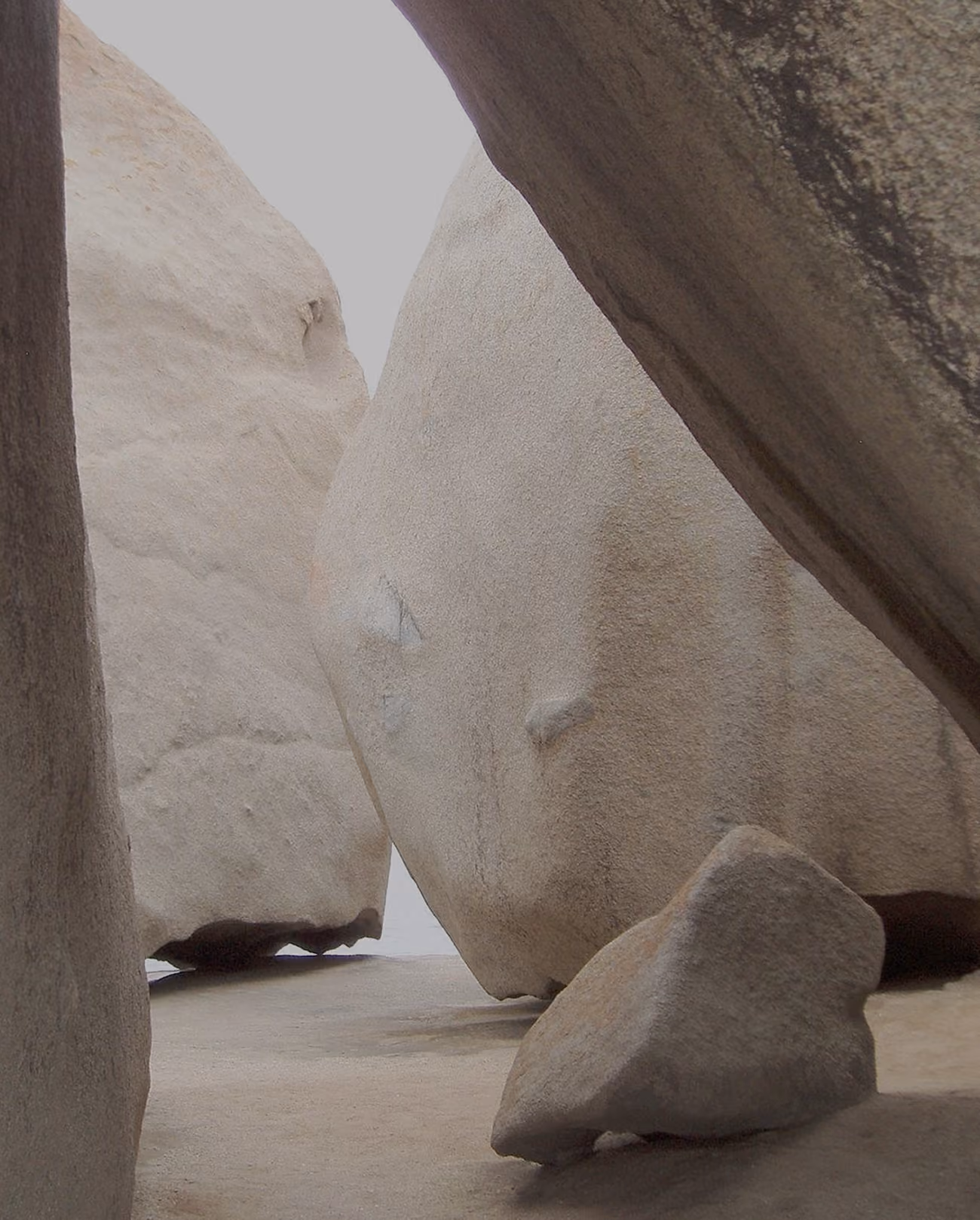 white rocks on sandy beach