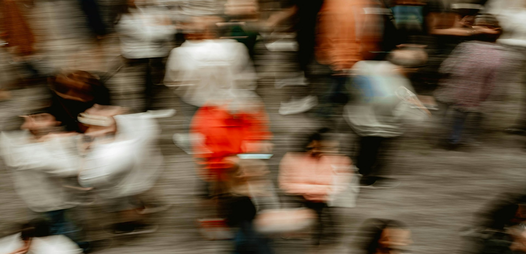 blurred people in city