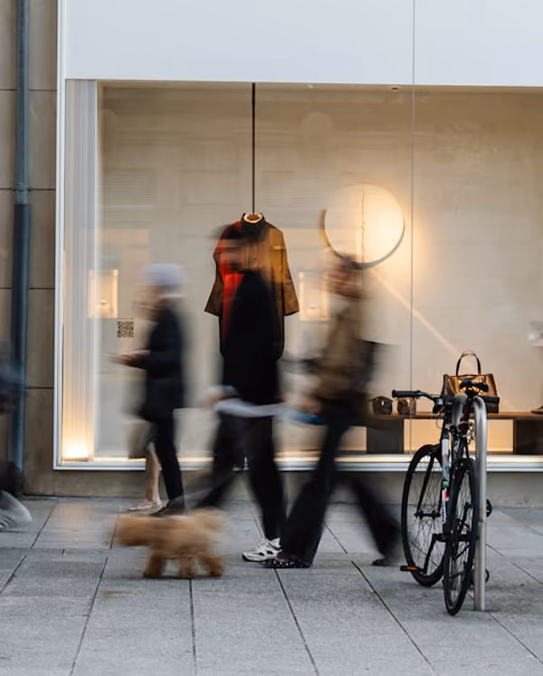blurry people walking in city