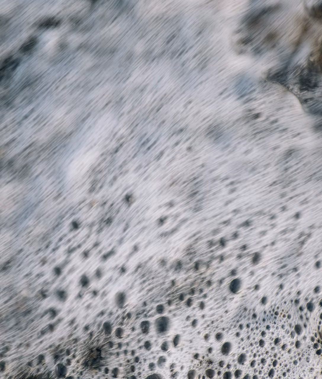 close up of sea foam ocean
