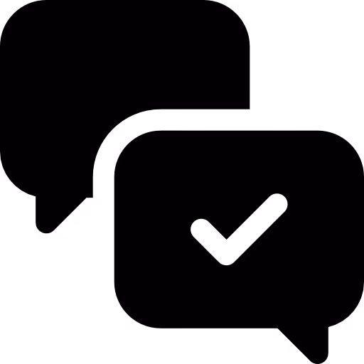 Two black chat bubbles, one with a white checkmark inside.