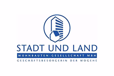 STADT UND LAND Logo mit stilisiertem Hochhaus und Unternehmensnamen in blauer Schrift.