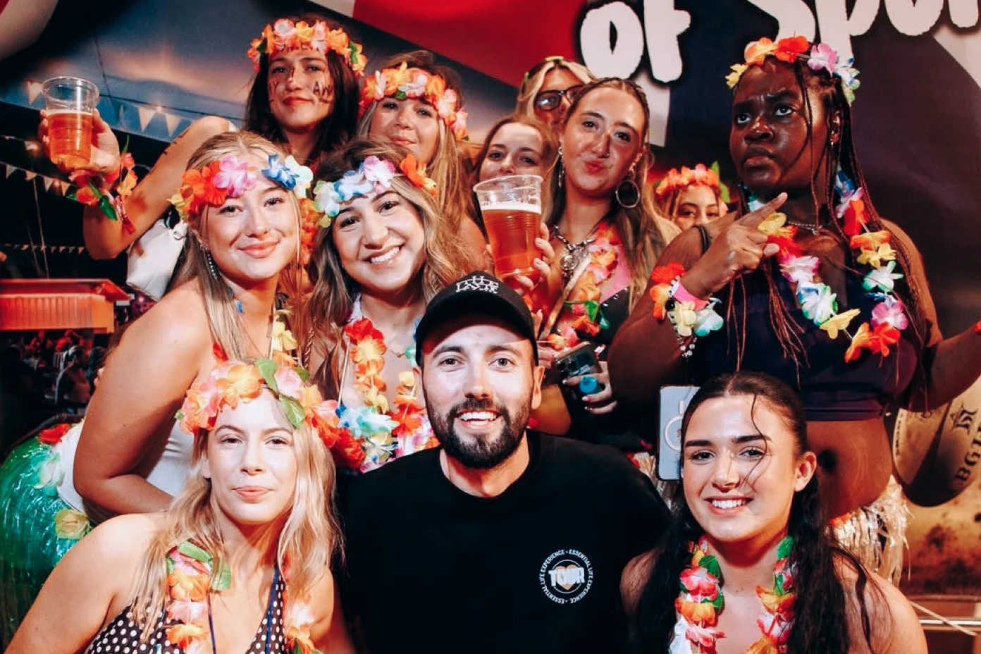 Group photo of friends enjoying a festival together.
