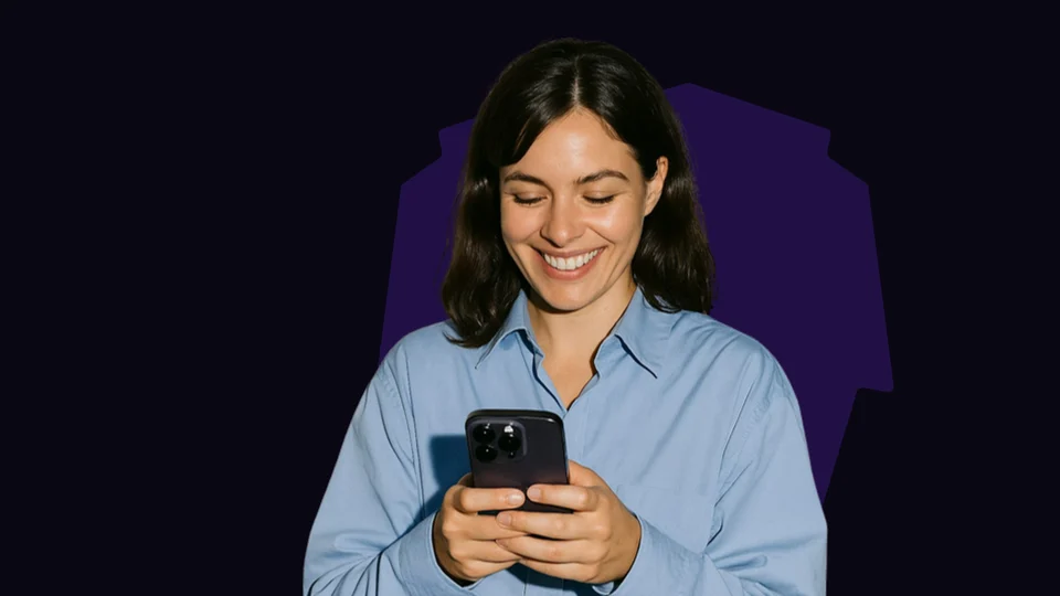 The Black Friday Loyalty Strategy course cover: a woman in a blue shirt smiling at her phone