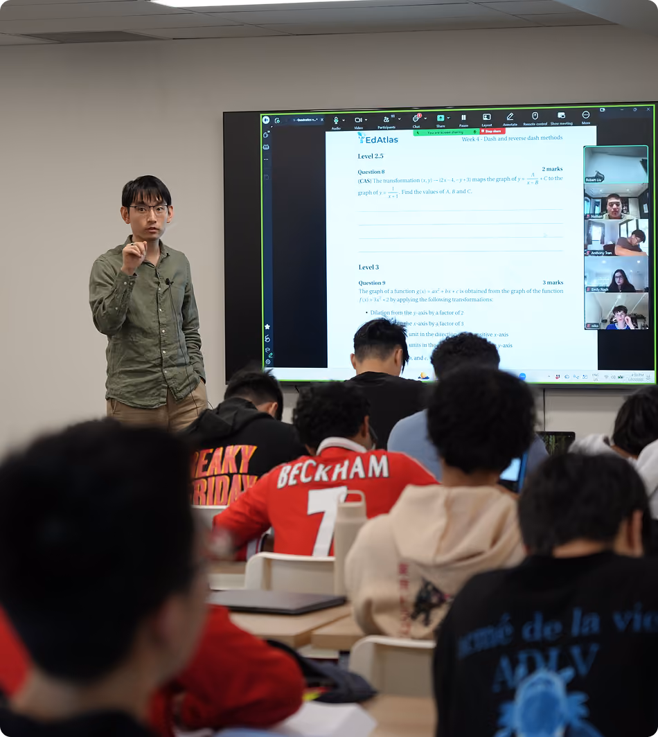A professionally framed portrait showing tutor teaching students during a live vce class, presented as part of EdAtlas student, tutor or program storytelling content.