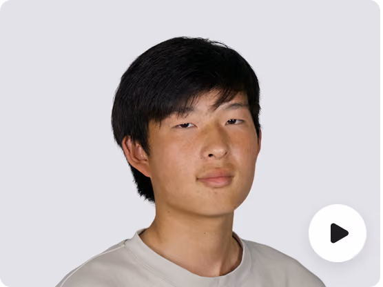 A circular play-button symbol with a dark triangular arrow in the center, indicating that the associated EdAtlas image opens a video.