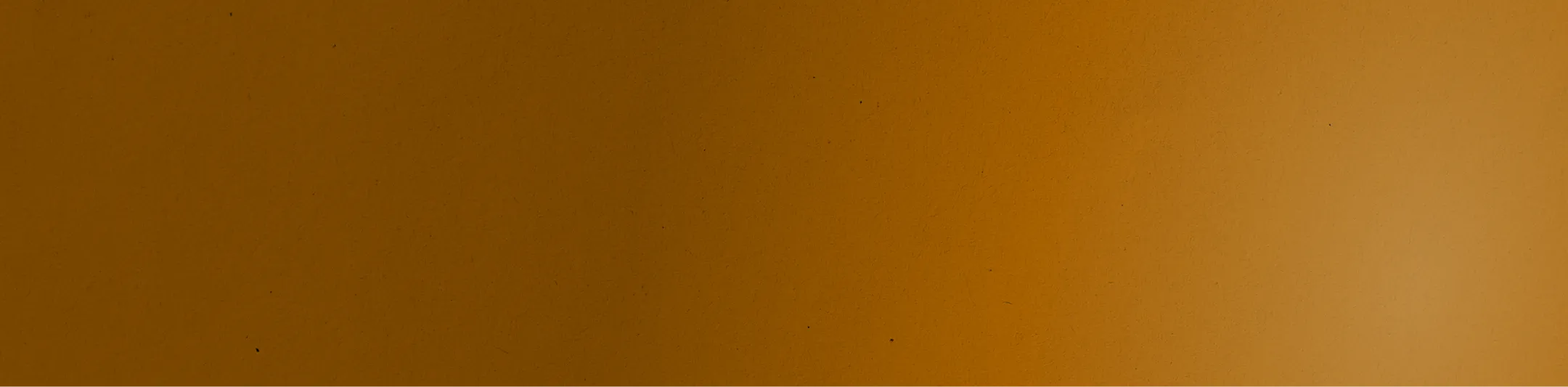 Brown gradient background with scattered textures and dark spots.