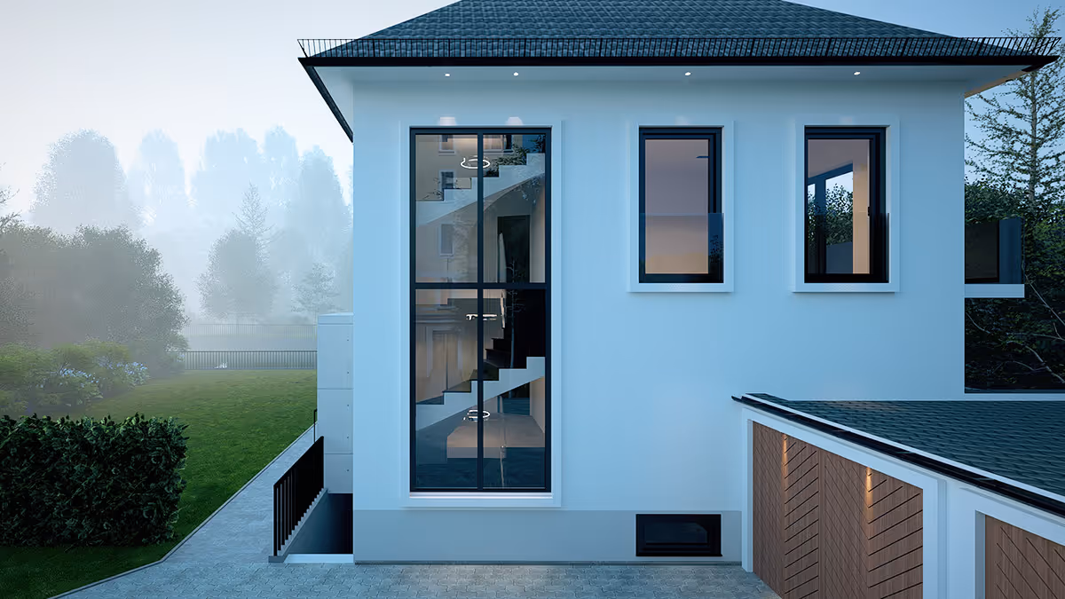 Modernes zweistöckiges Haus mit großem Fenster, durch das eine Treppe sichtbar ist, grauem Dach und Garage mit Holztüren.